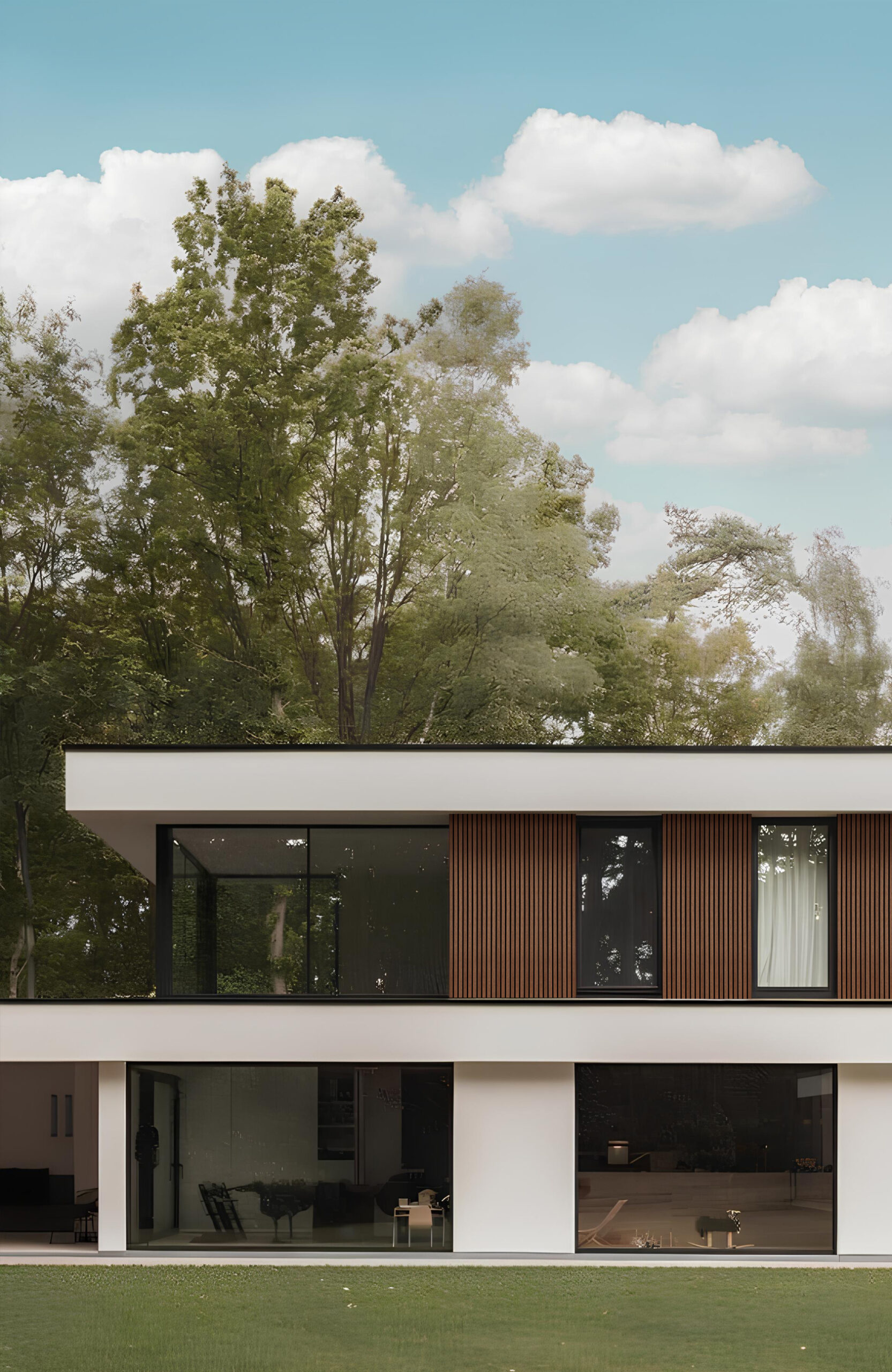 Modern house with large glass windows and vertical wooden slats, set against green lawn and trees under a blue sky.