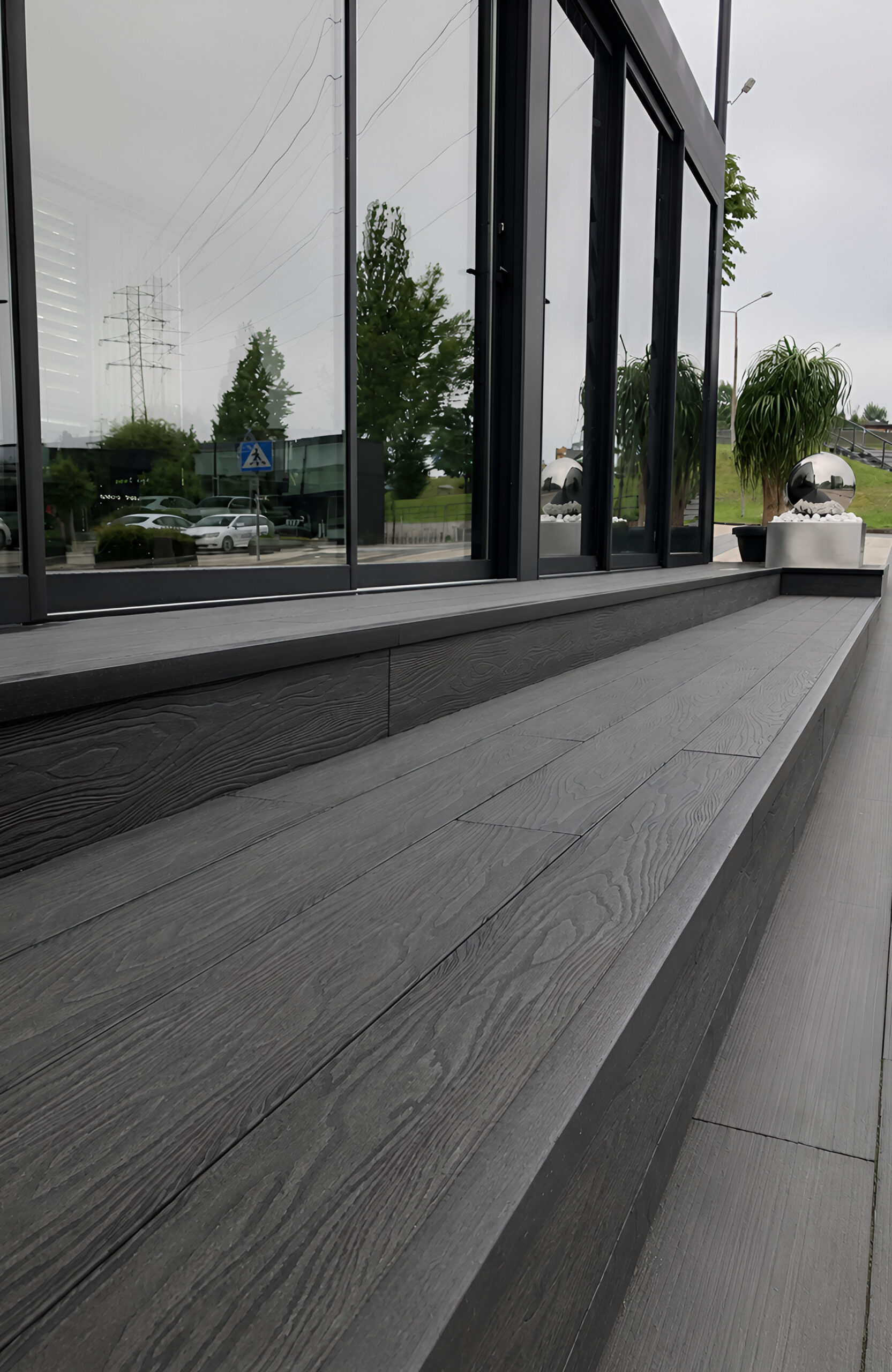 Modern outdoor steps finished with Bruggan Elegant Anthracite composite decking