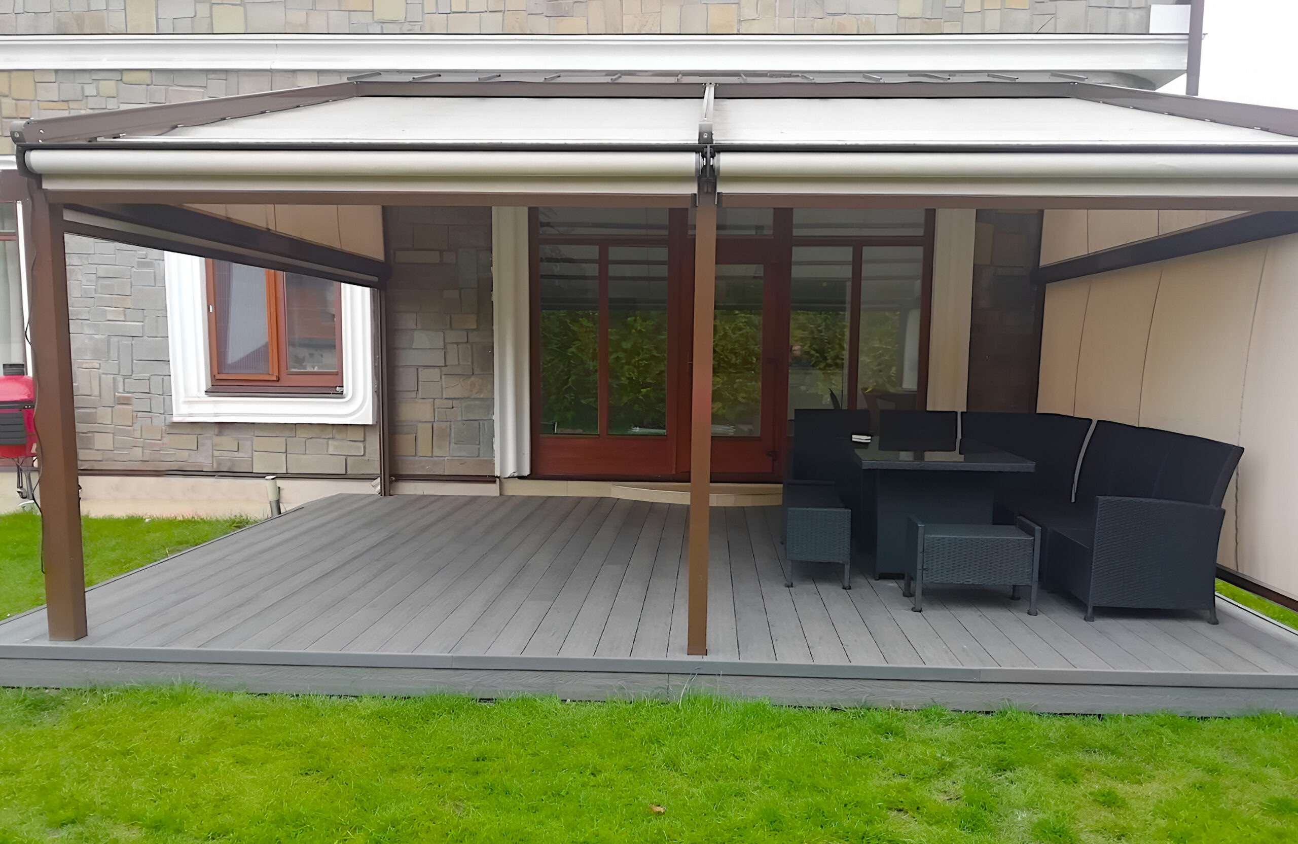 Modern covered terrace finished with Bruggan Elegant Graphite composite decking
