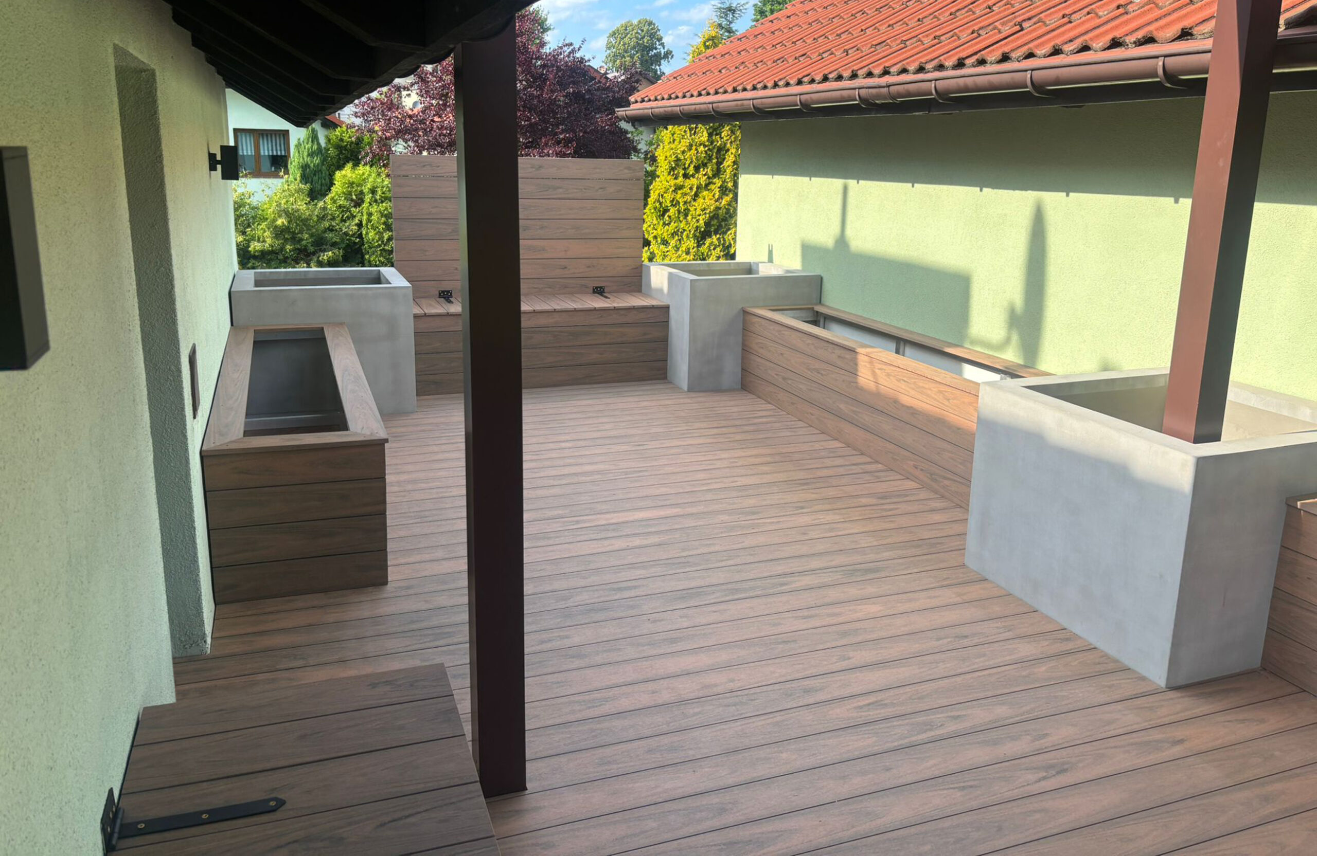 Spacious terrace finished with Bruggan Multicolor Cedar wood-look composite decking