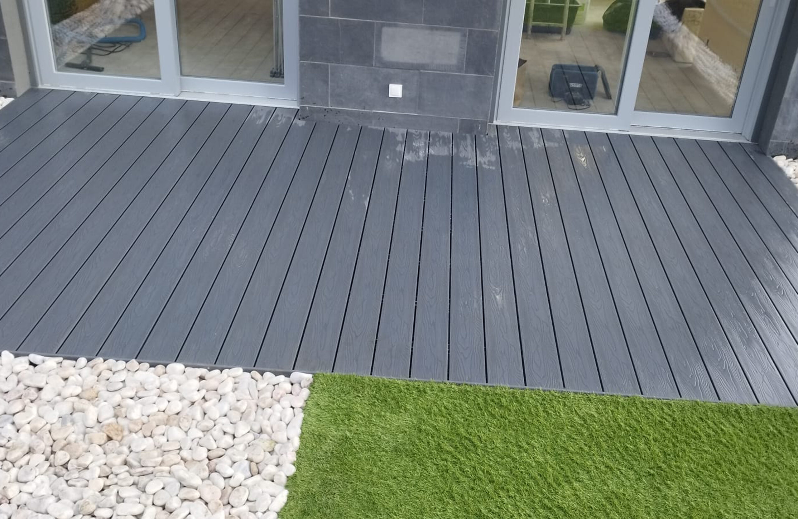 Bruggan Elegant anthracite decking installed on a modern house terrace
