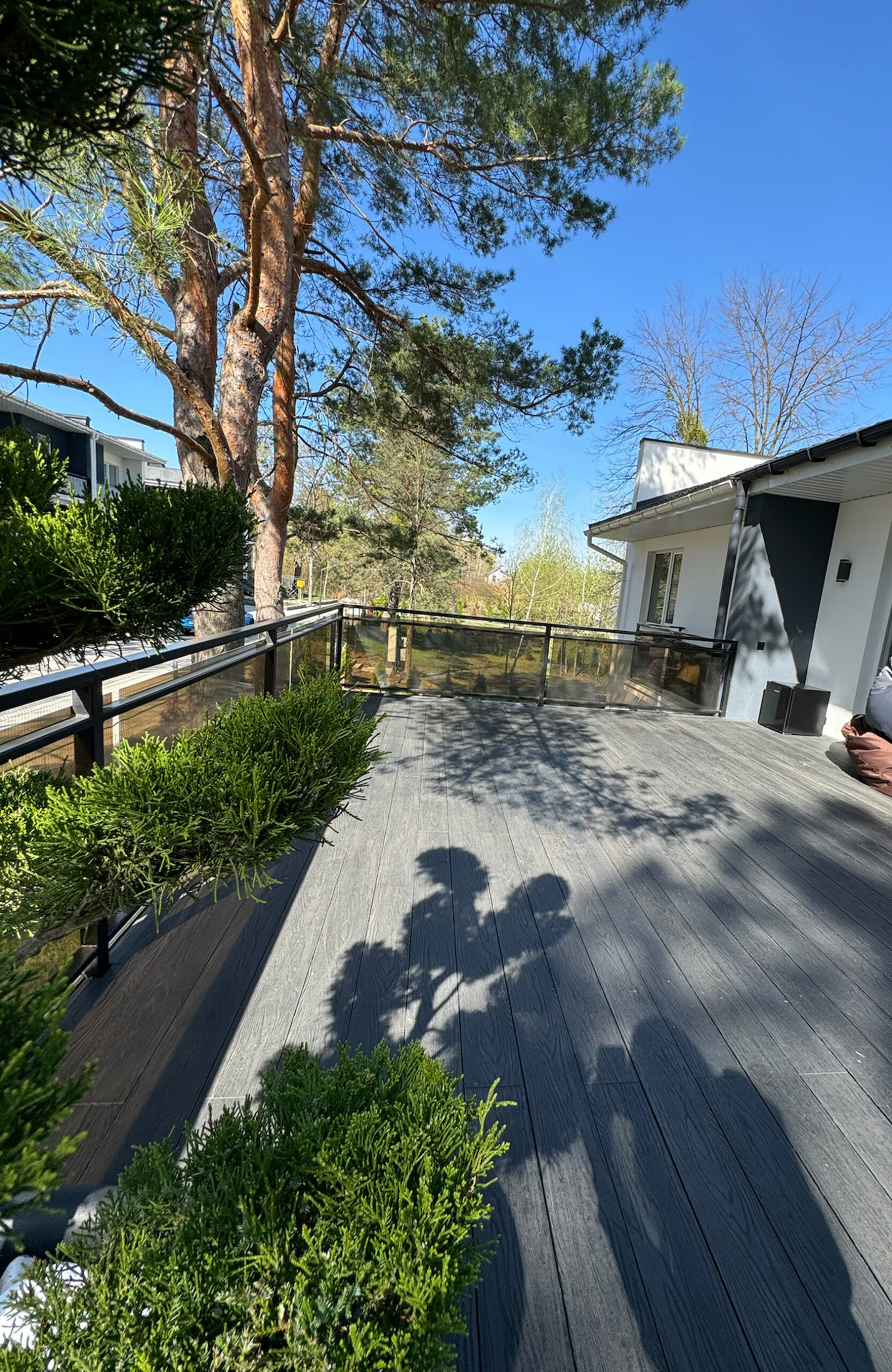 Close-up of anthracite composite decking with realistic wood grain texture