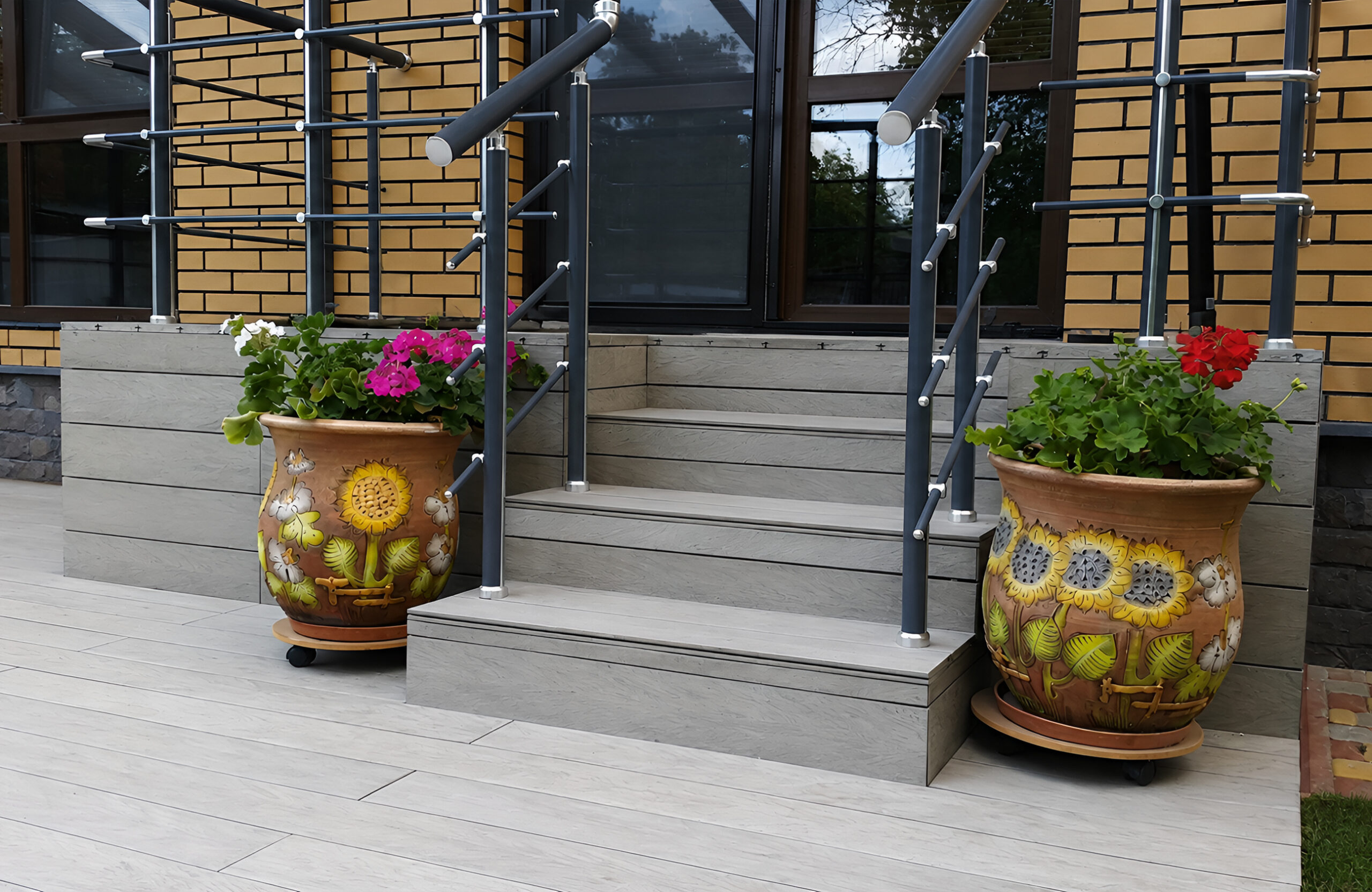 Outdoor staircase and terrace finished with BRUGGAN Multicolor grey decking boards