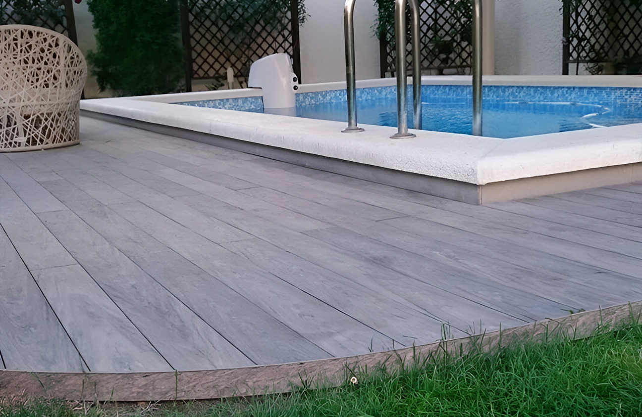 Modern pool terrace finished with BRUGGAN Multicolor grey decking boards