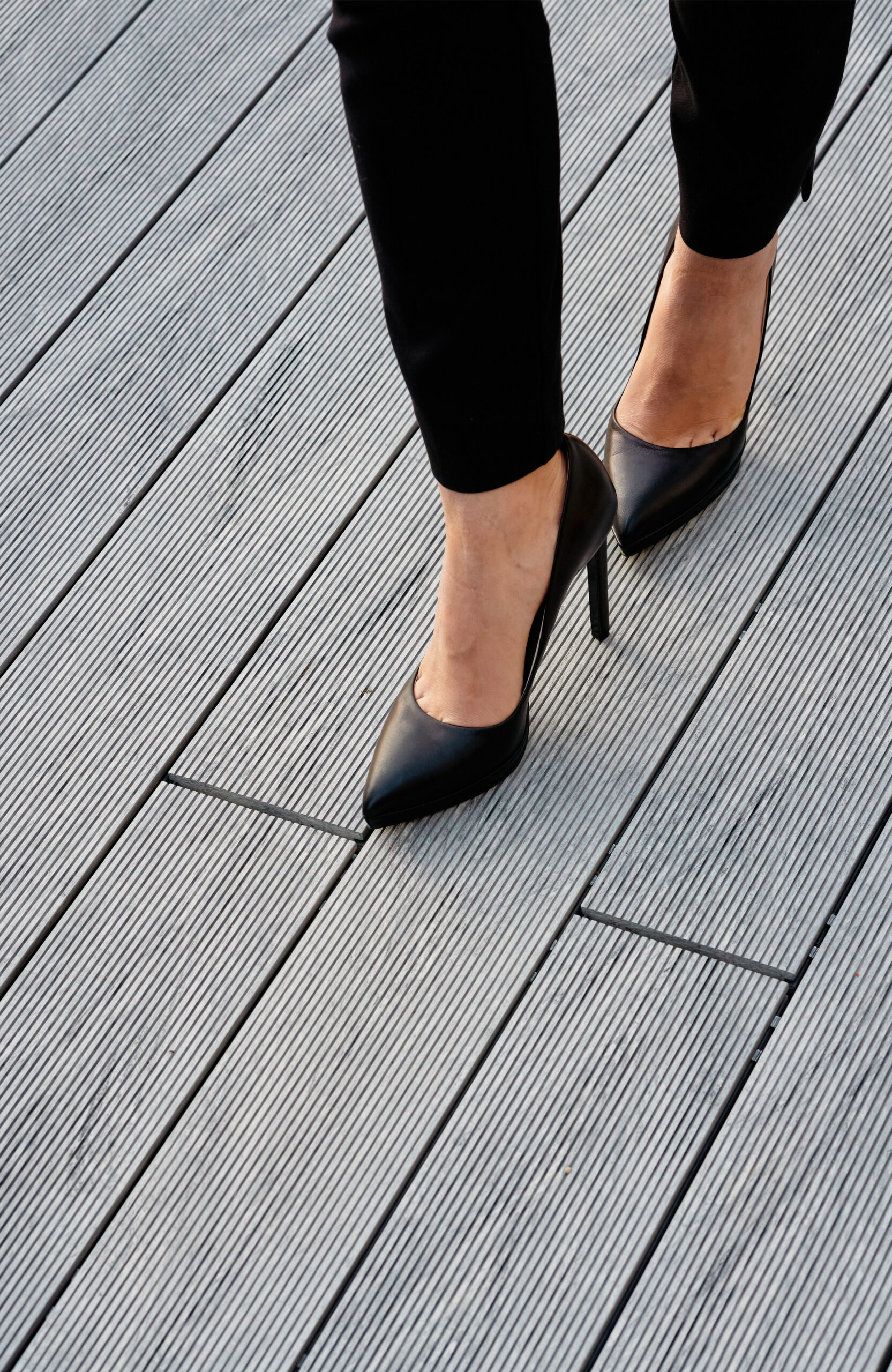 Grey BRUGGAN Multicolor composite decking with a grooved surface for modern outdoor terraces