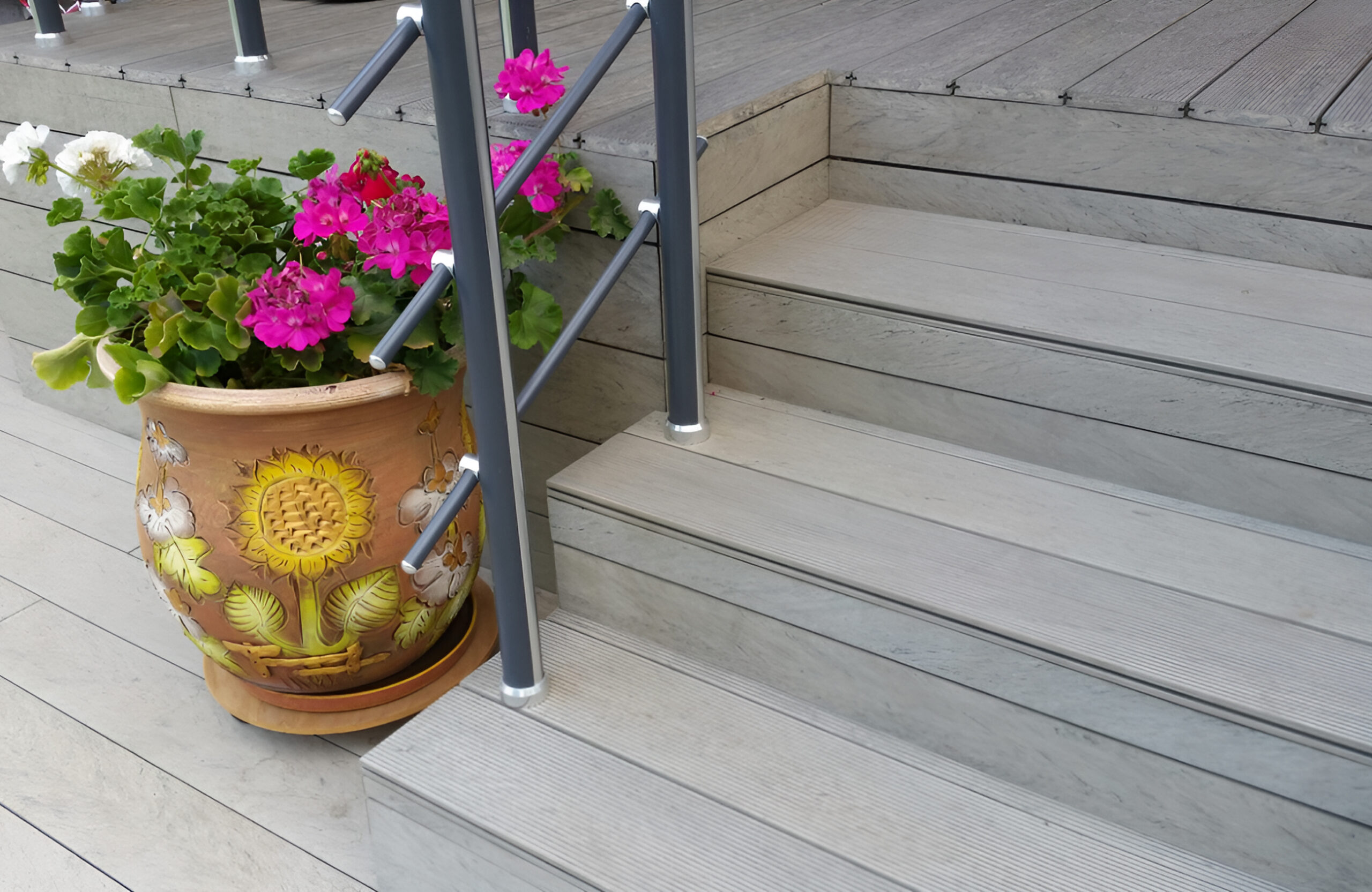 Outdoor staircase and terrace finished with BRUGGAN Multicolor grey decking boards