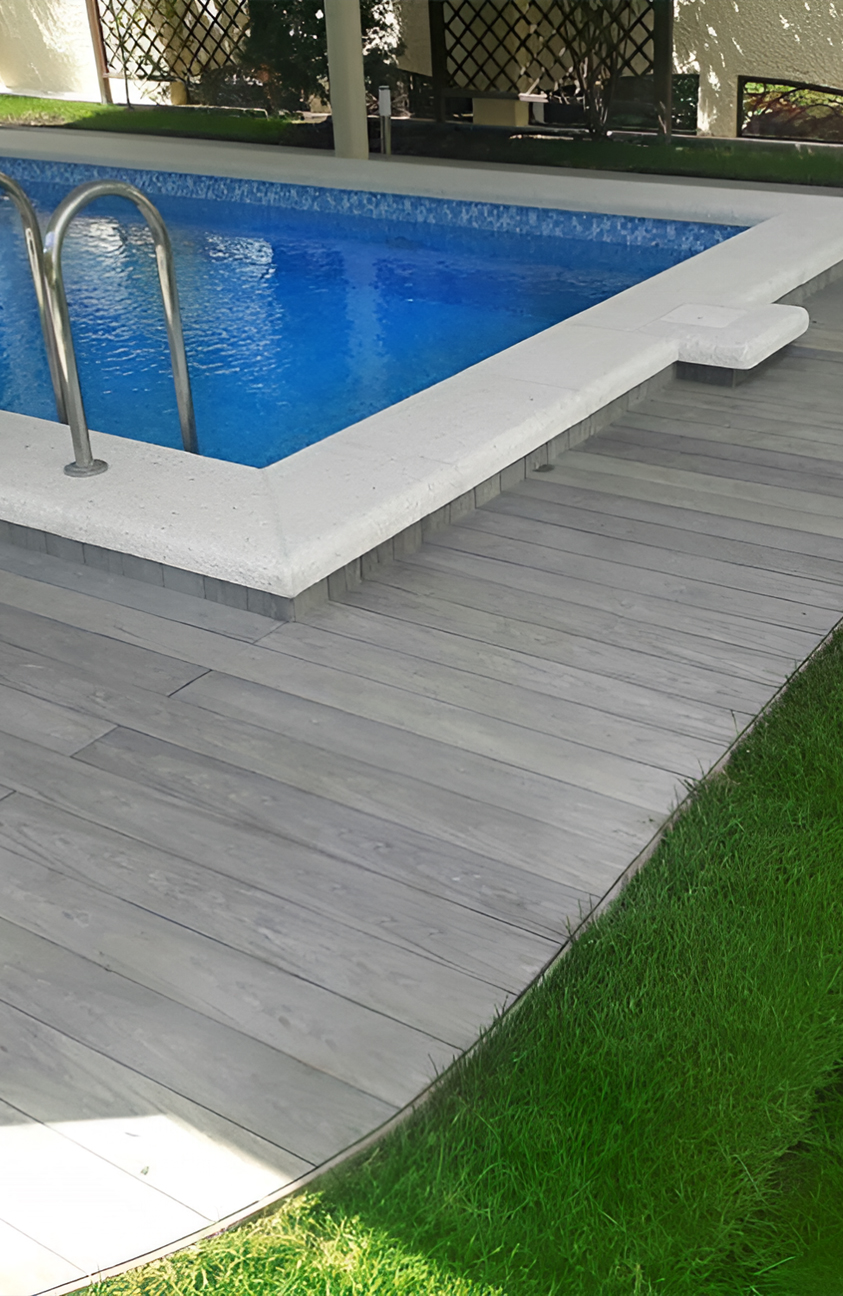 Modern pool terrace finished with BRUGGAN Multicolor grey decking boards