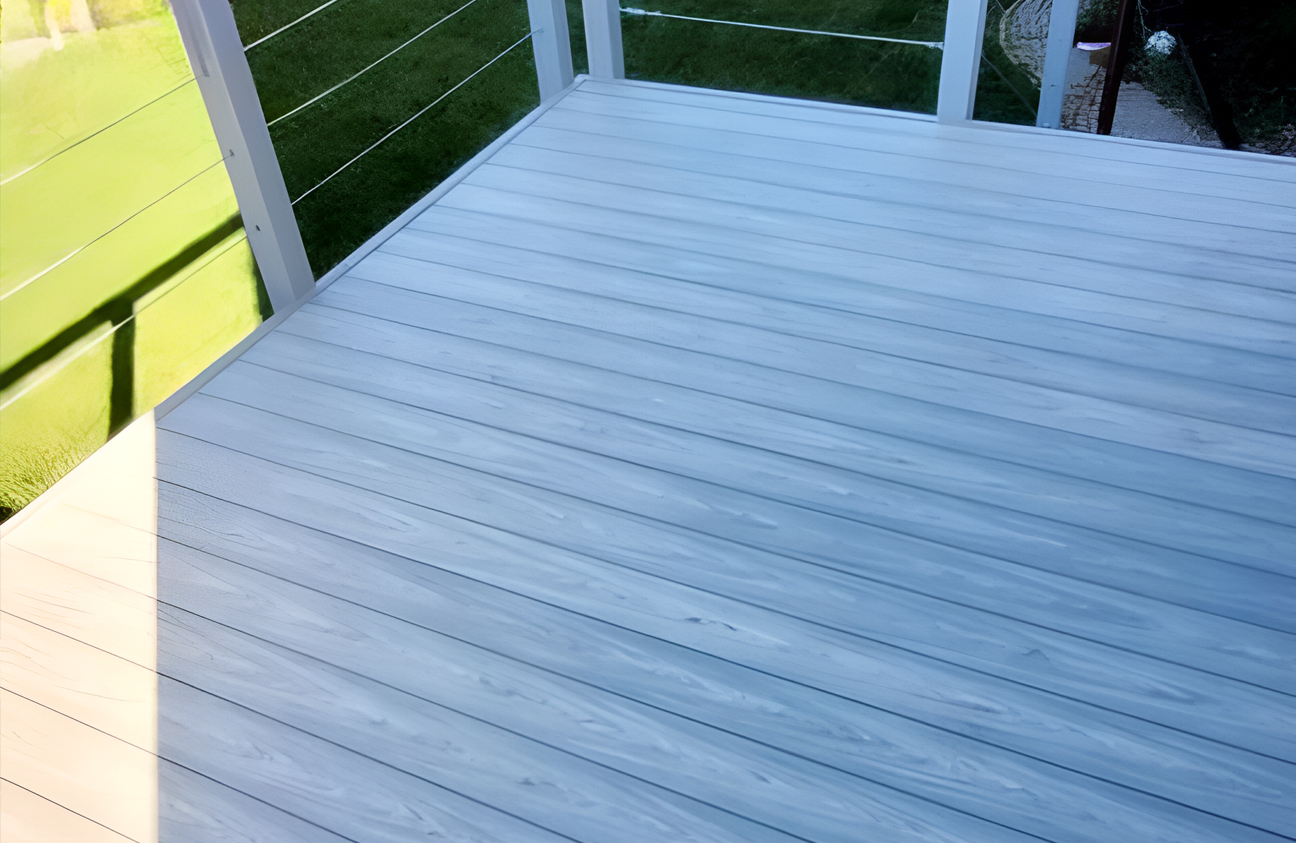 Modern garden terrace finished with BRUGGAN Multicolor grey decking boards and outdoor lounge furniture