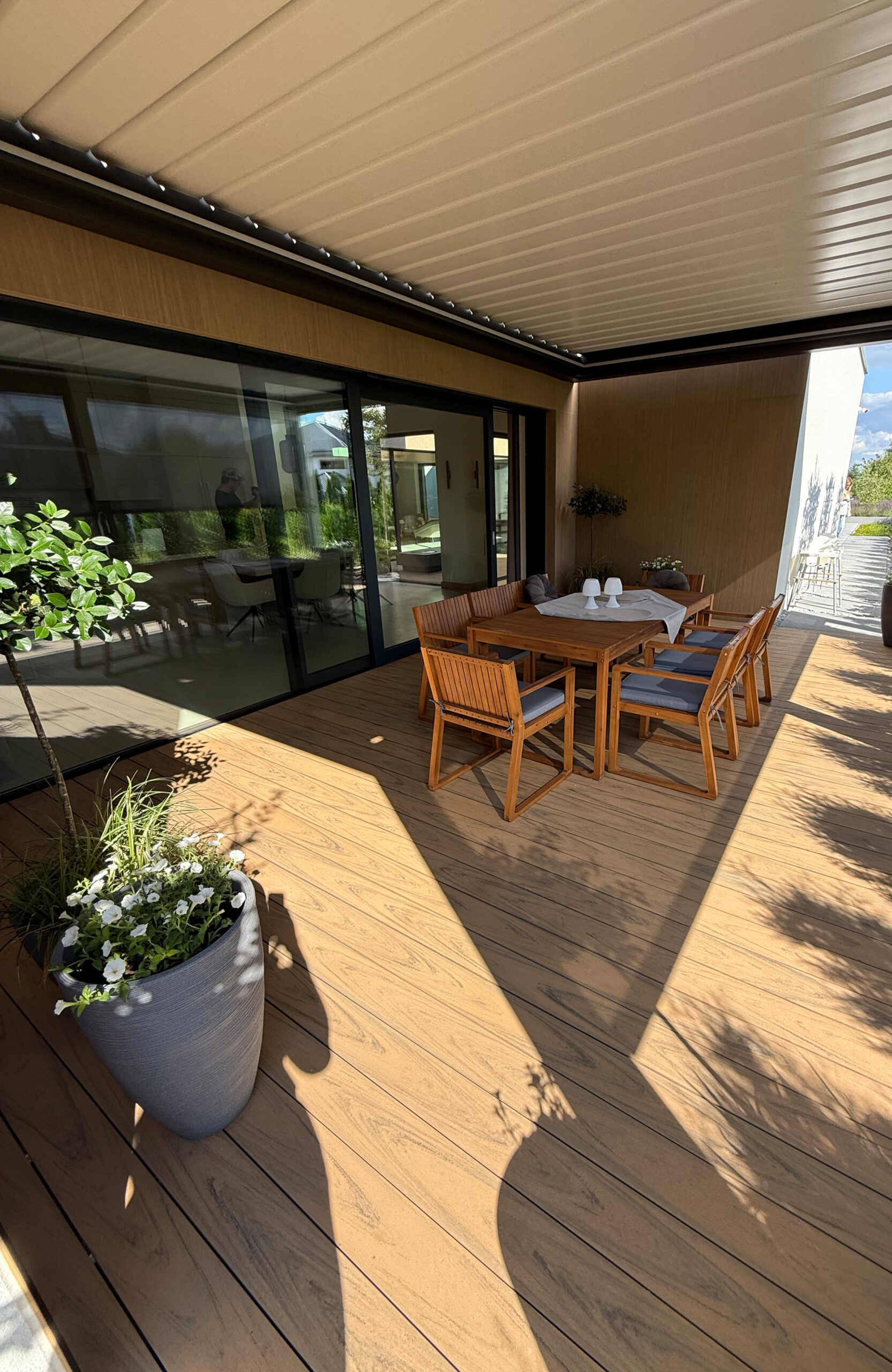 Modern outdoor terrace and pool area finished with BRUGGAN Multicolor sand decking