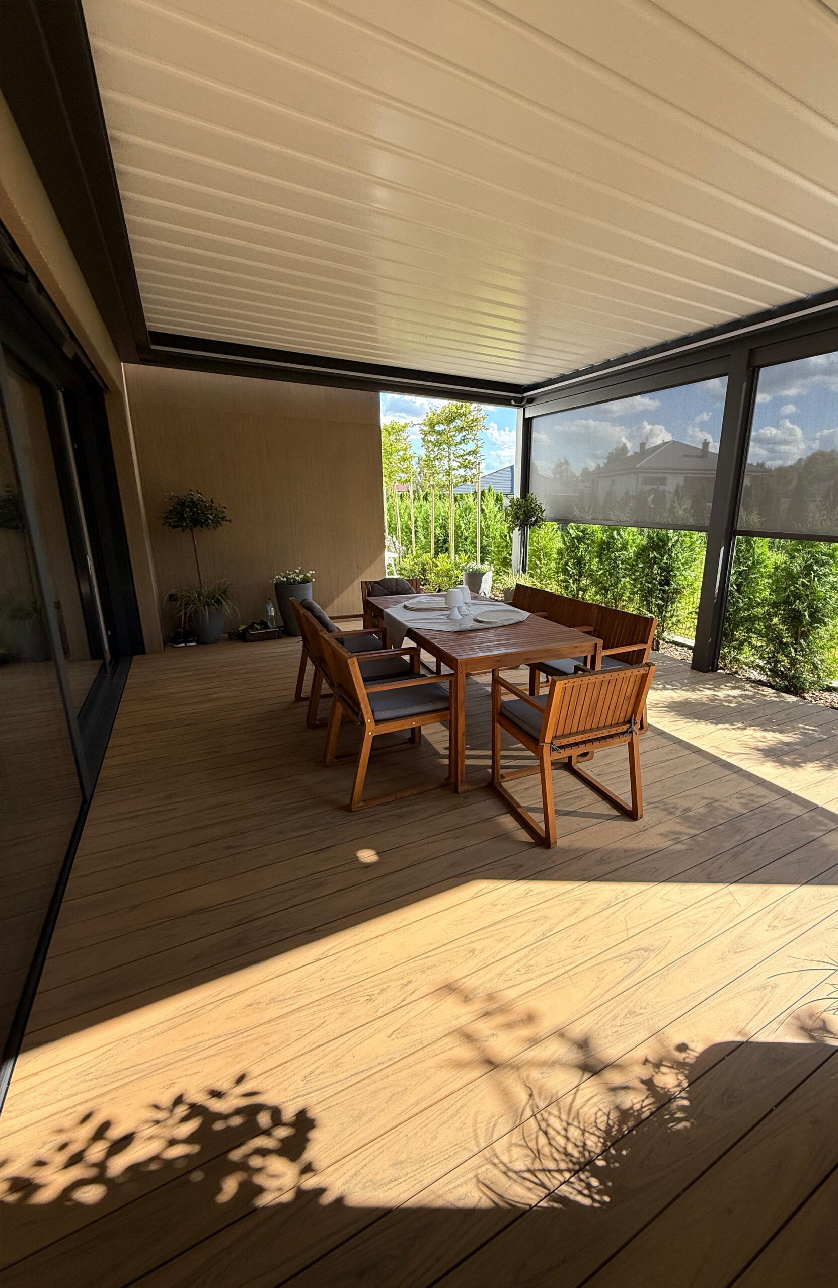 Modern outdoor terrace and pool area finished with BRUGGAN Multicolor sand decking