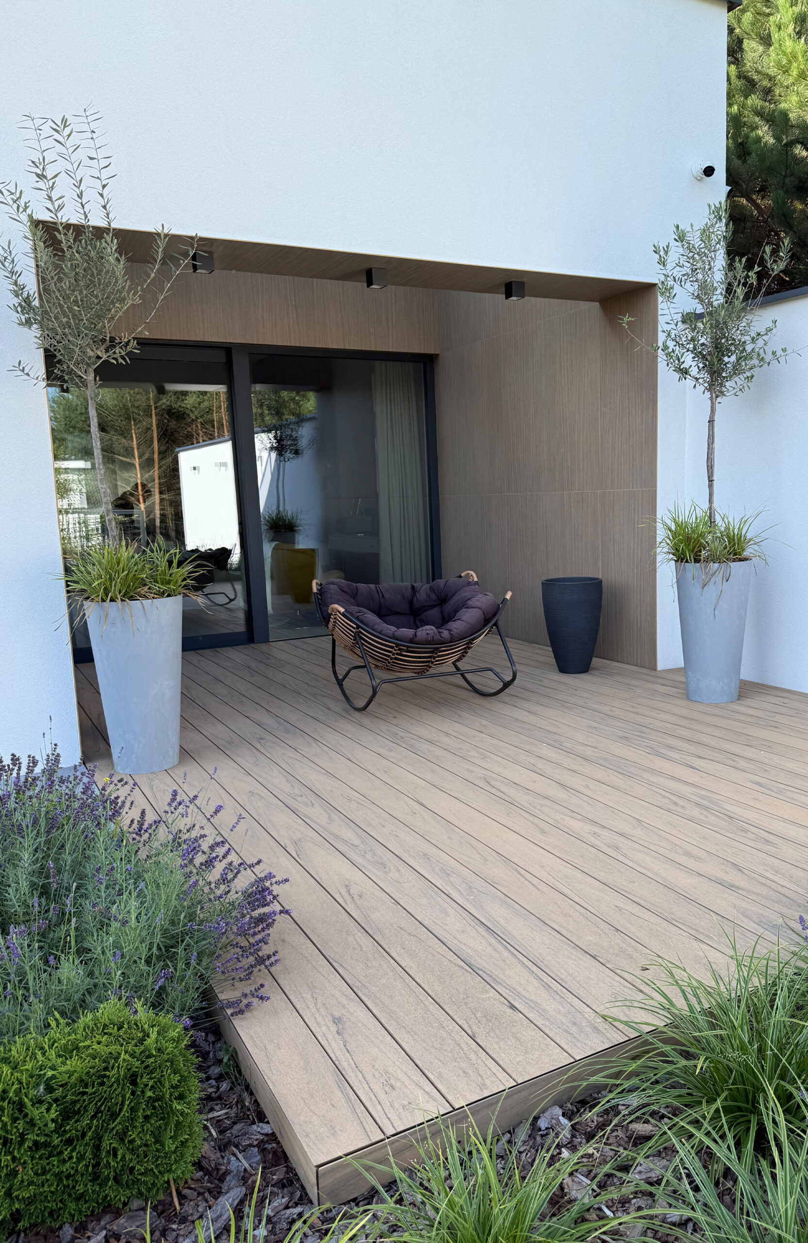 Modern outdoor terrace and pool area finished with BRUGGAN Multicolor sand decking