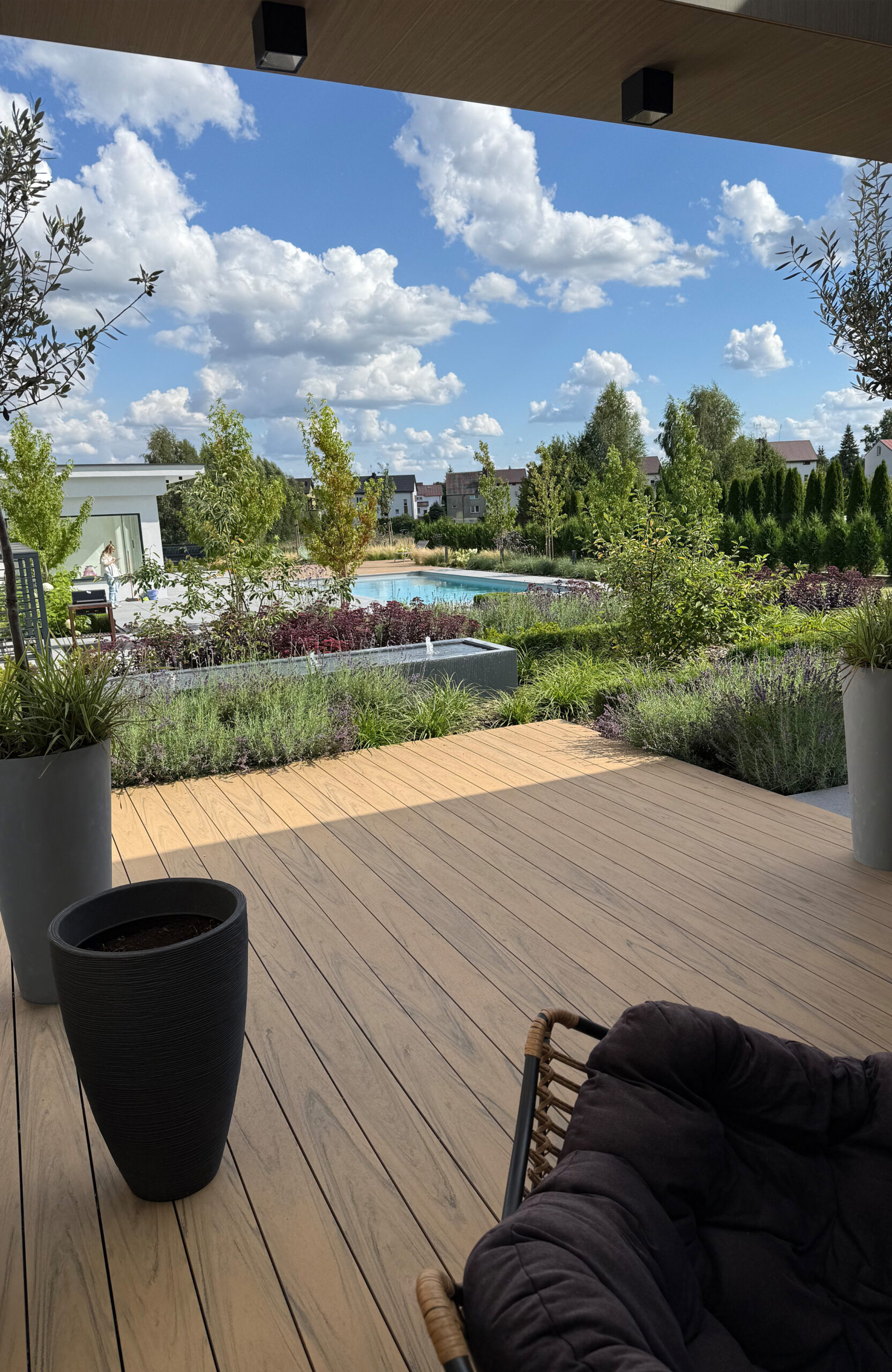 Modern outdoor terrace and pool area finished with BRUGGAN Multicolor sand decking