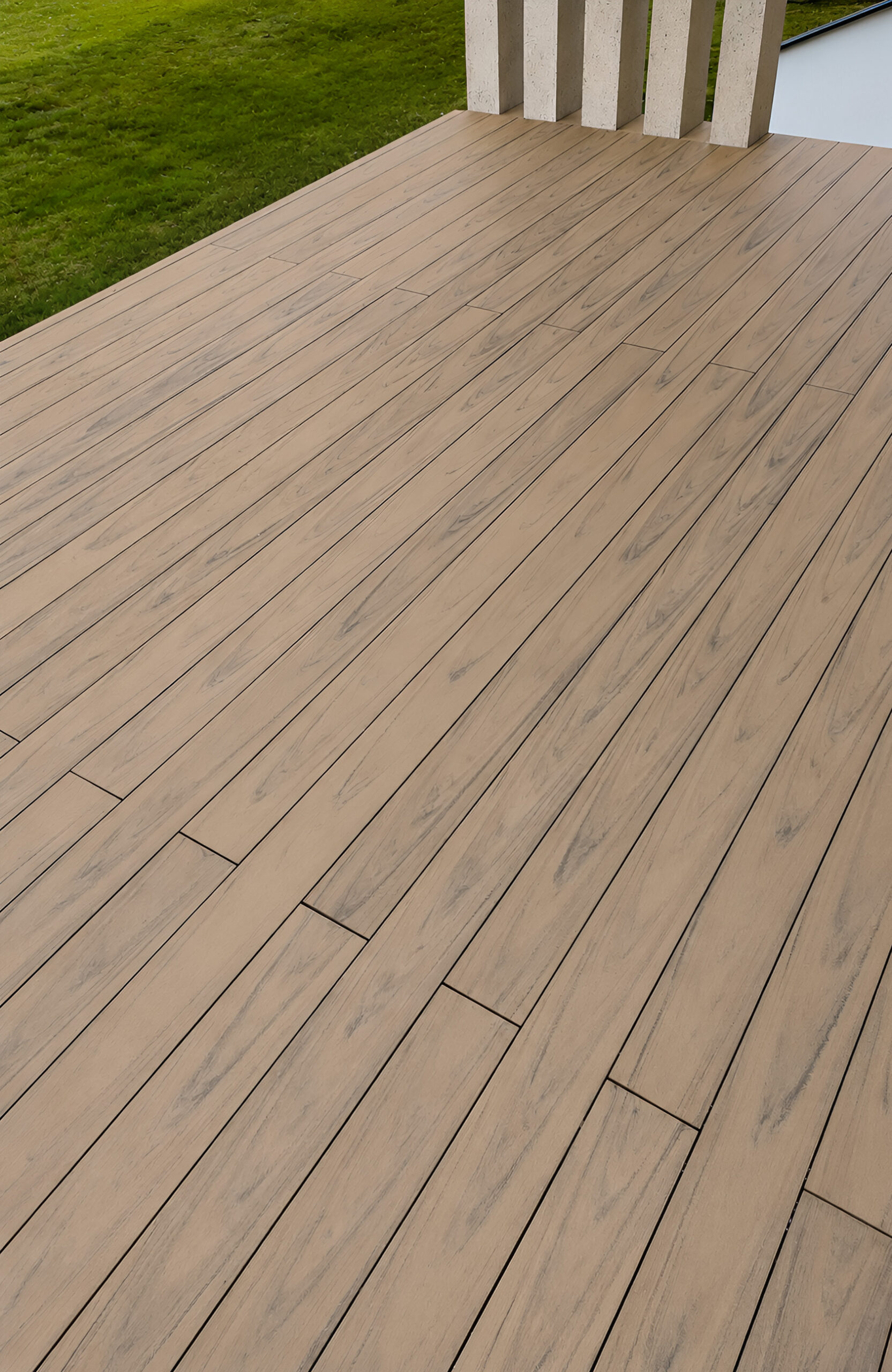 BRUGGAN Multicolor Sand WPC decking with natural wood grain on a contemporary home terrace
