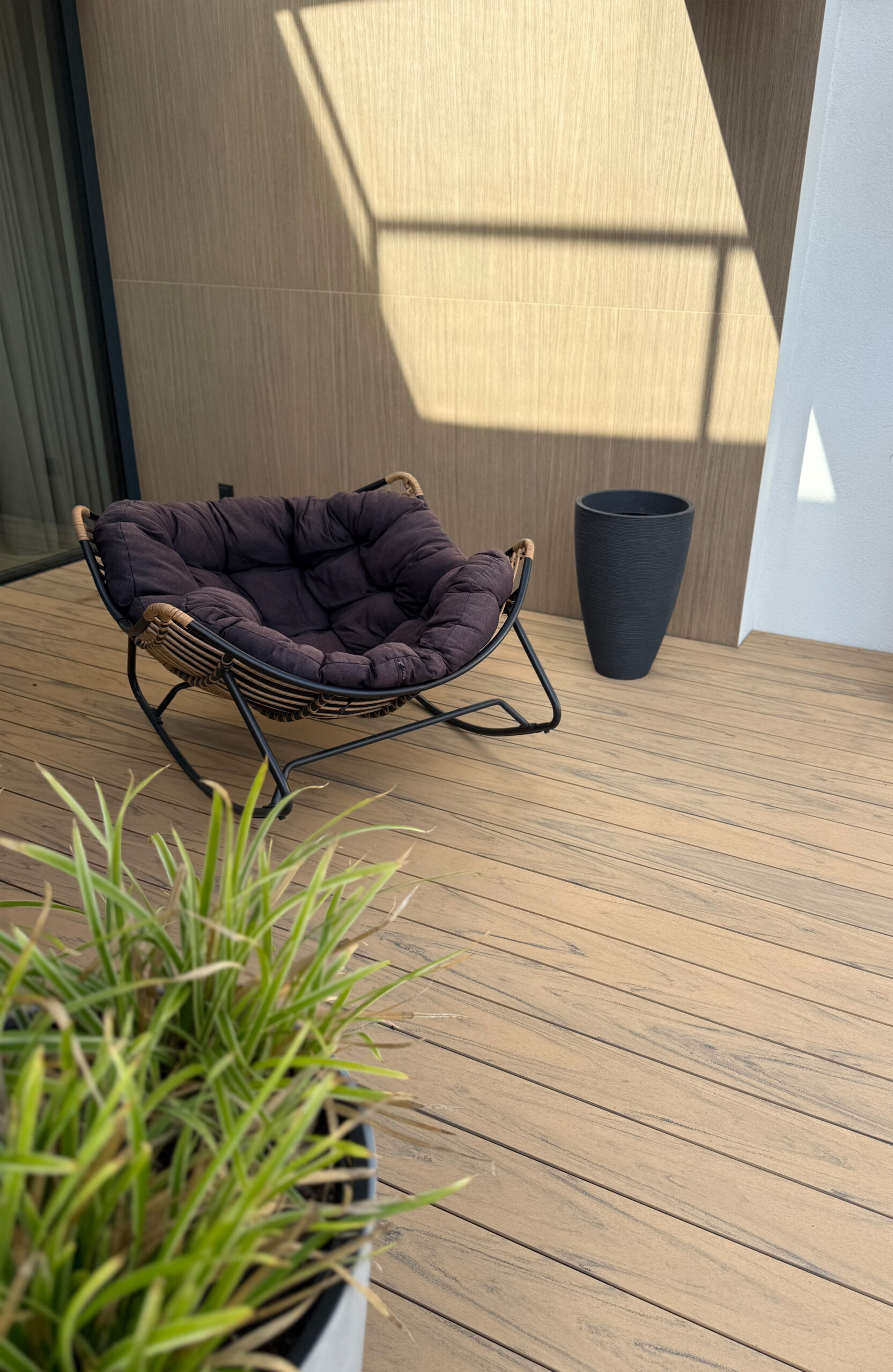 Modern outdoor terrace and pool area finished with BRUGGAN Multicolor sand decking