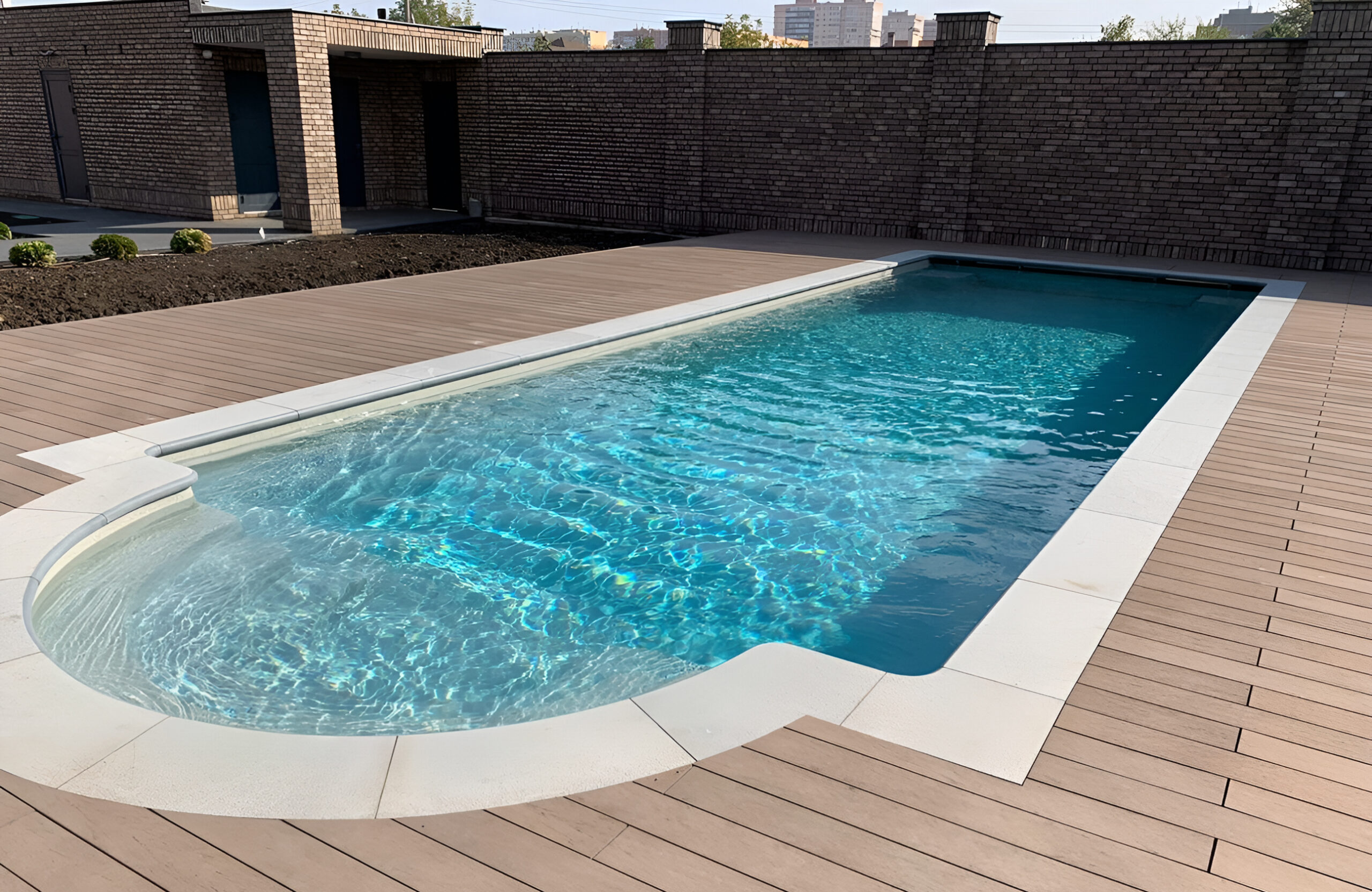 Outdoor pool area finished with BRUGGAN Multicolor Wenge decking