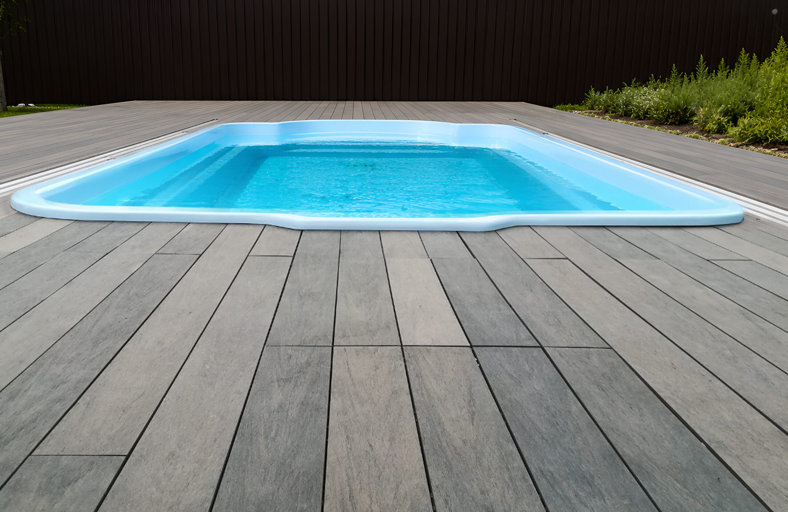 Swimming pool terrace with BRUGGAN Multicolor Wenge composite decking