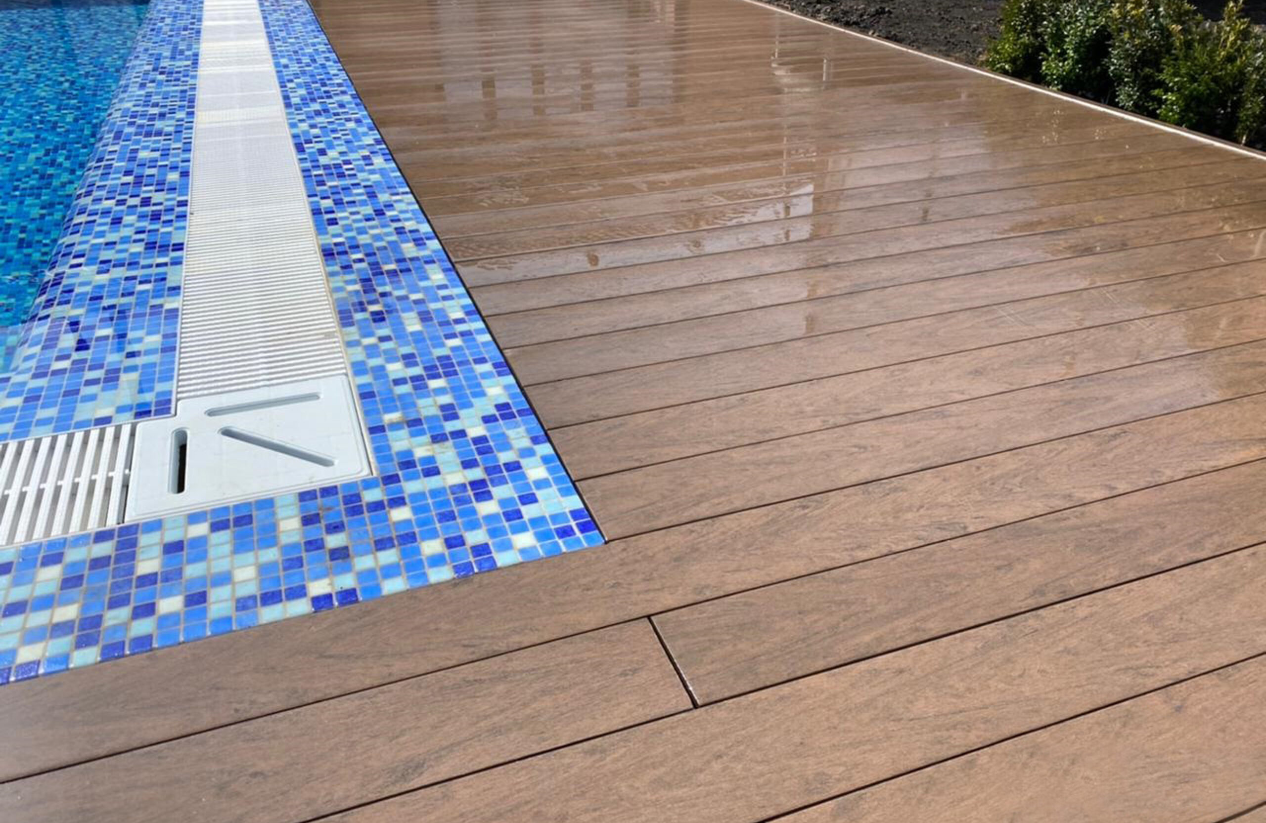 Outdoor pool terrace finished with BRUGGAN Multicolor Wenge decking