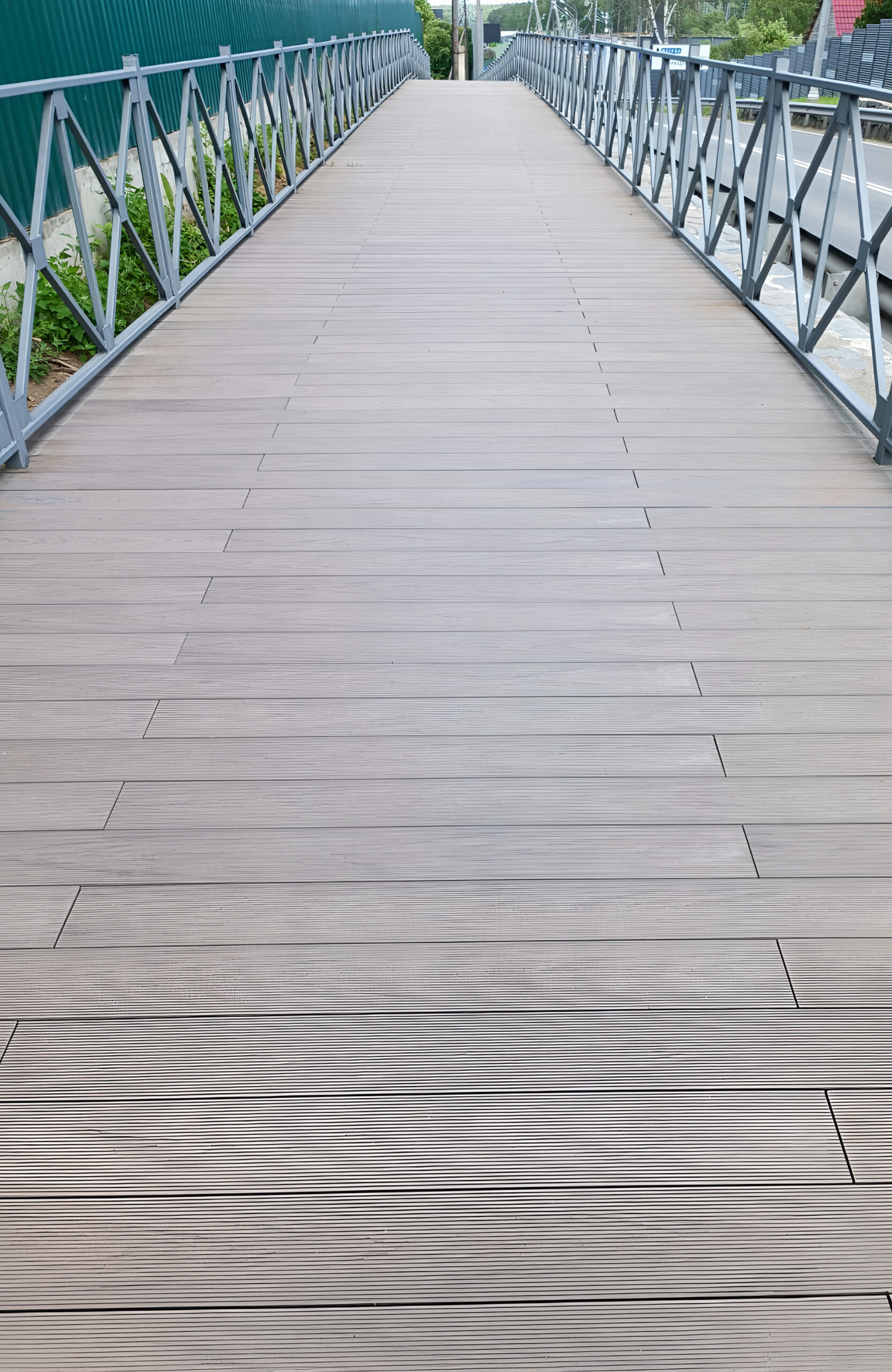 Pedestrian bridge finished with BRUGGAN Multicolor Wenge composite decking