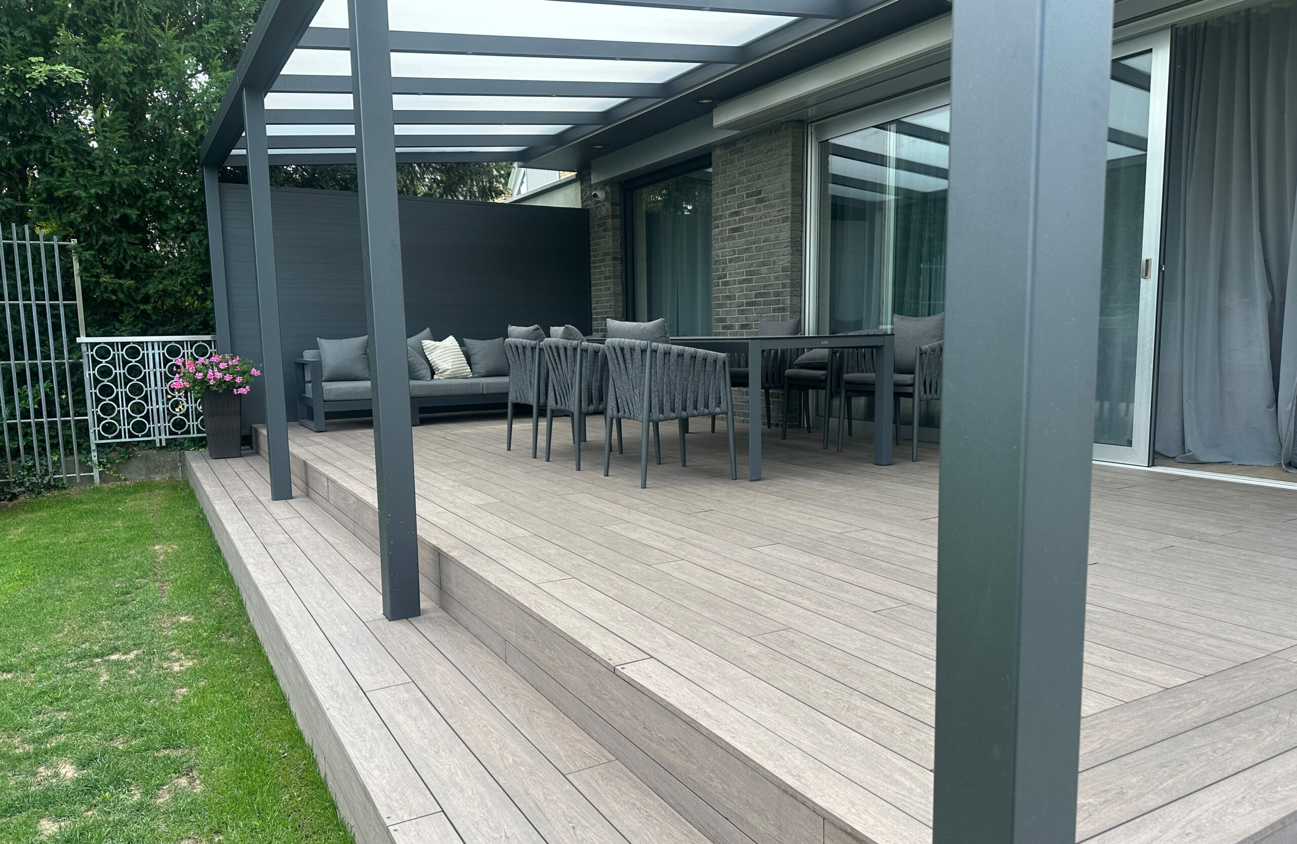 Modern garden terrace with pergola and BRUGGAN Multicolor Wenge decking boards