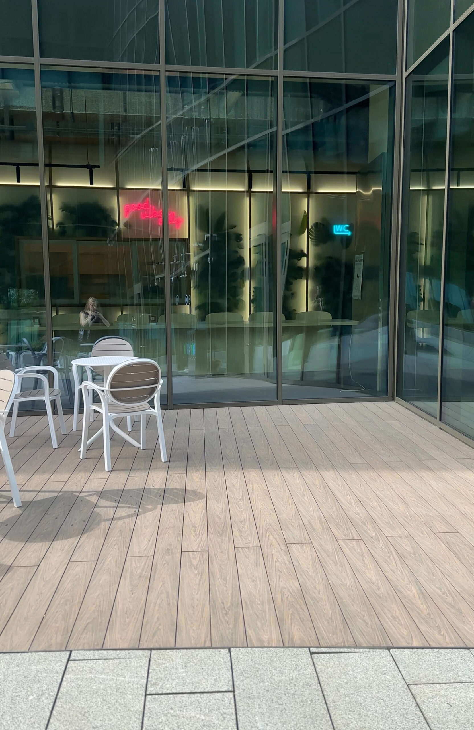 Modern café terrace finished with BRUGGAN Multicolor Wenge decking boards
