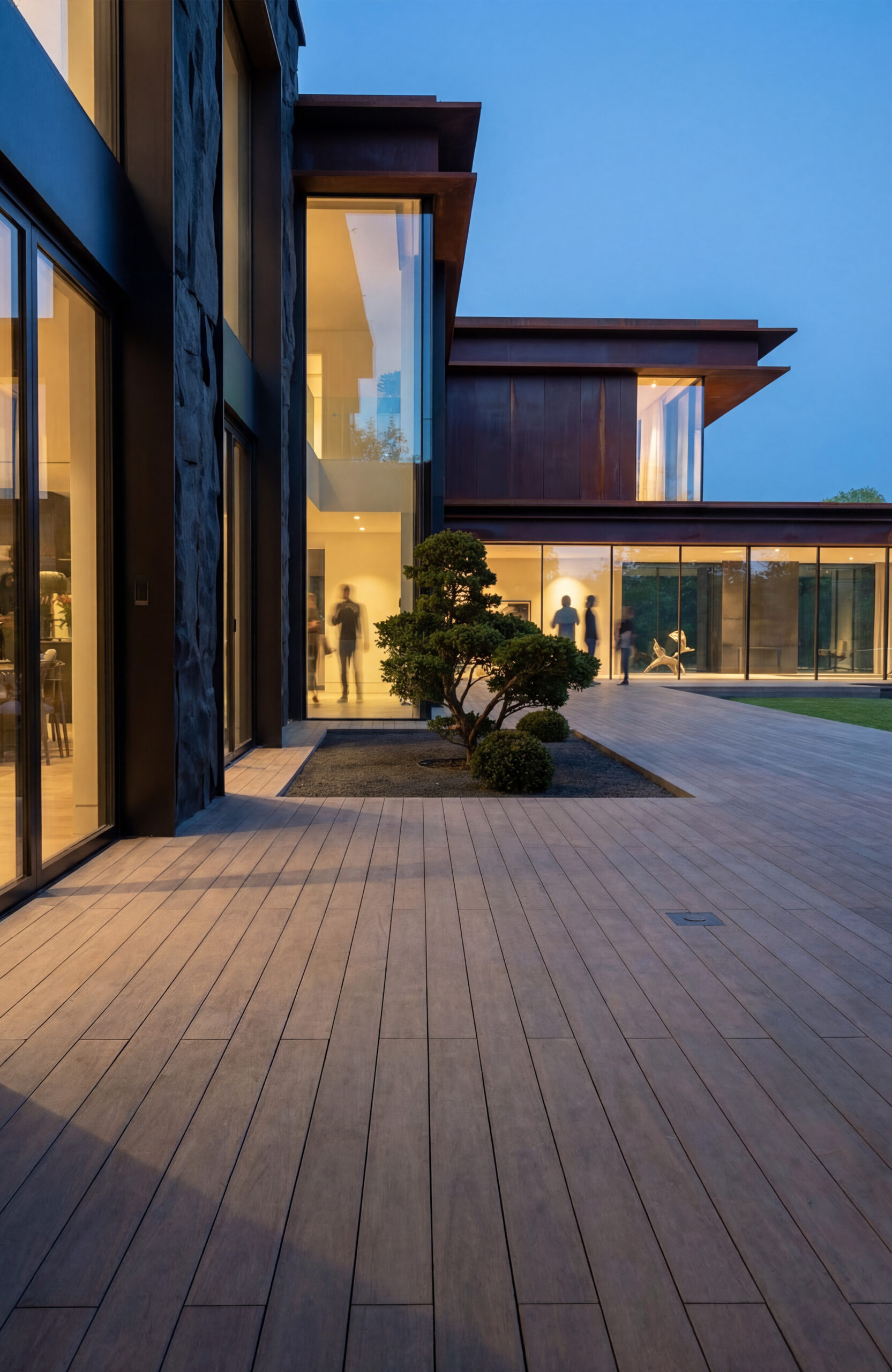Modern villa terrace with BRUGGAN Multicolor Wenge composite decking in Kyiv