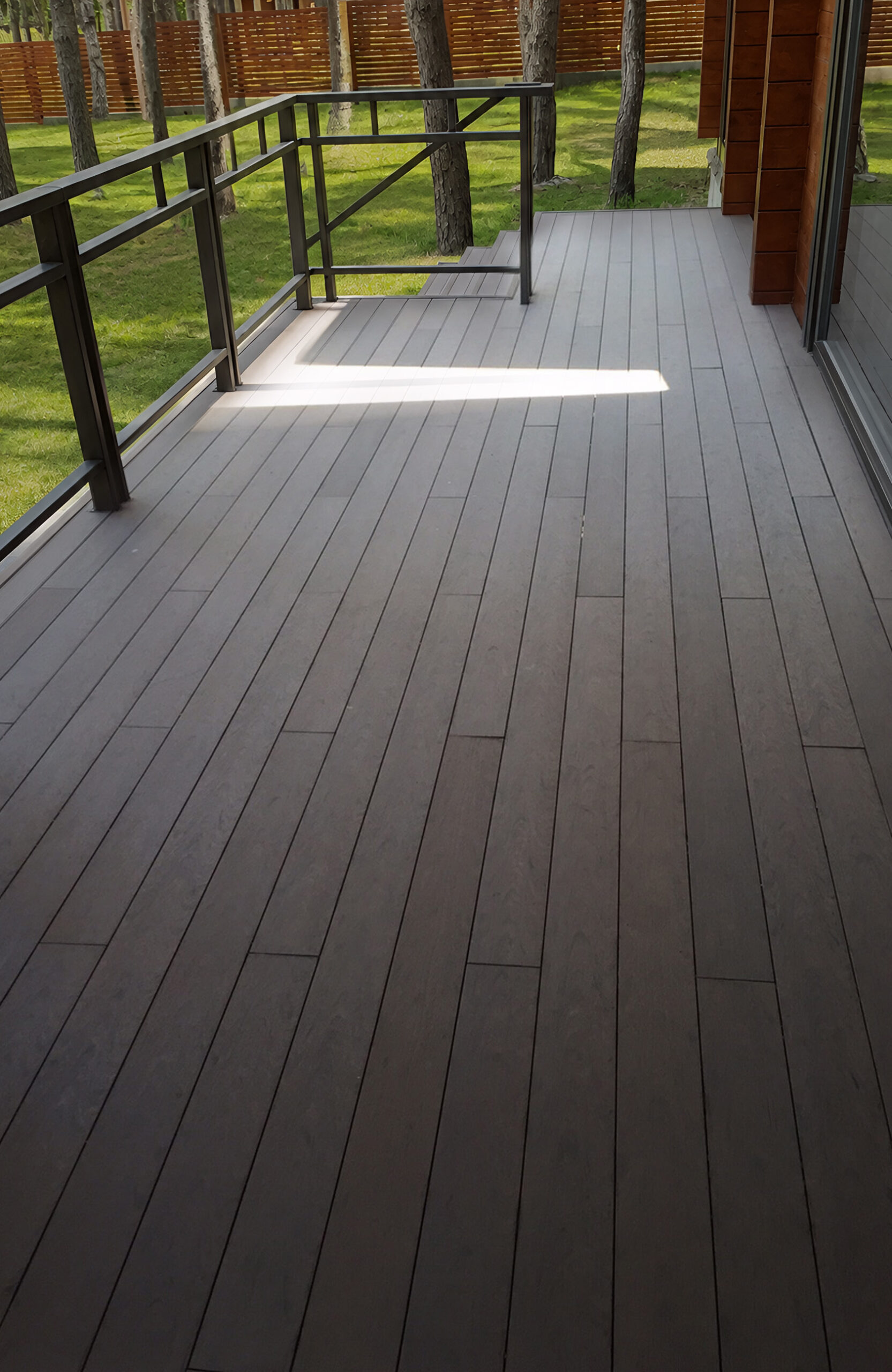 Outdoor terrace and steps finished with BRUGGAN Multicolor Wenge composite decking