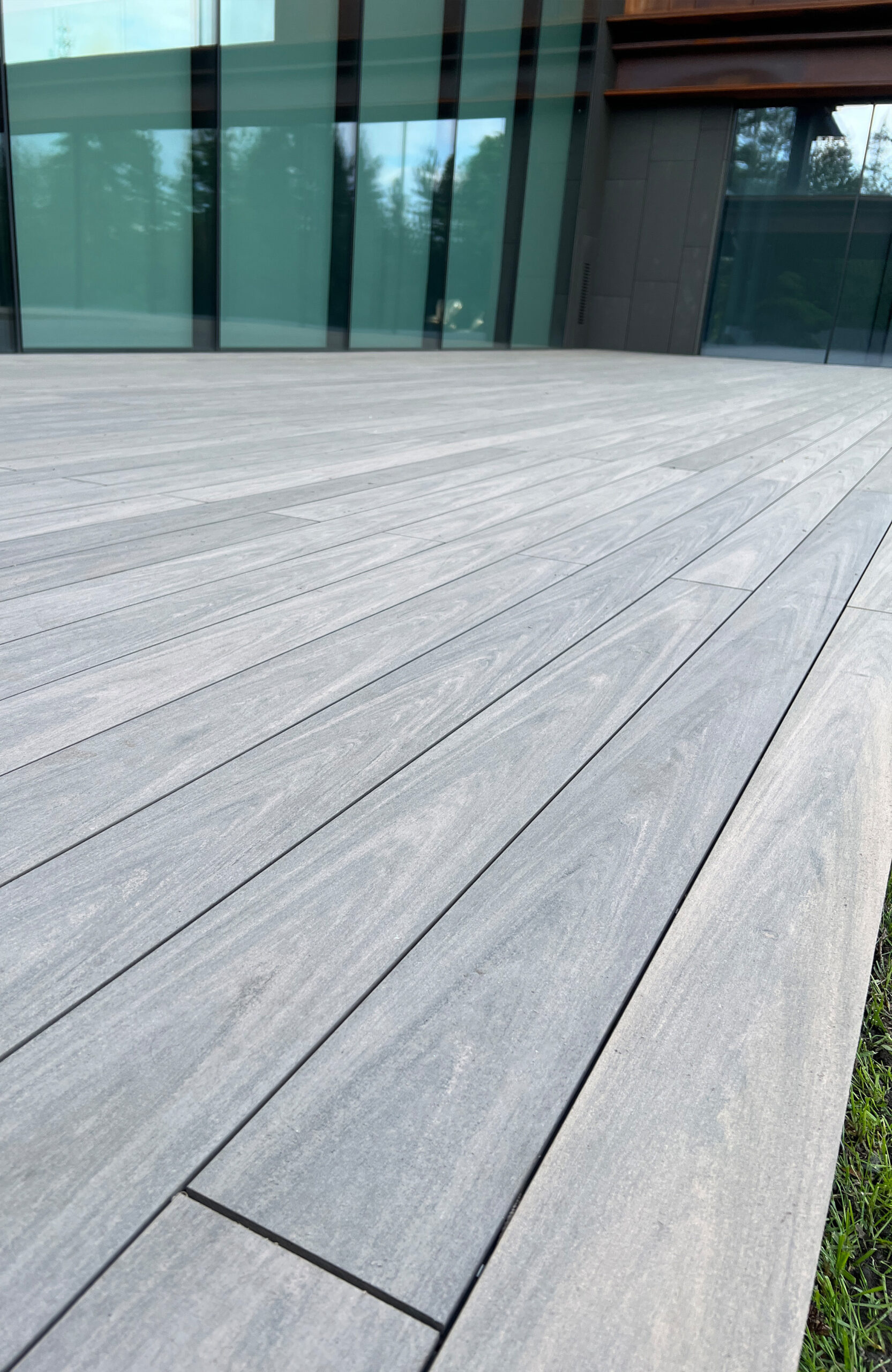 Modern villa terrace with BRUGGAN Multicolor Wenge composite decking in Kyiv