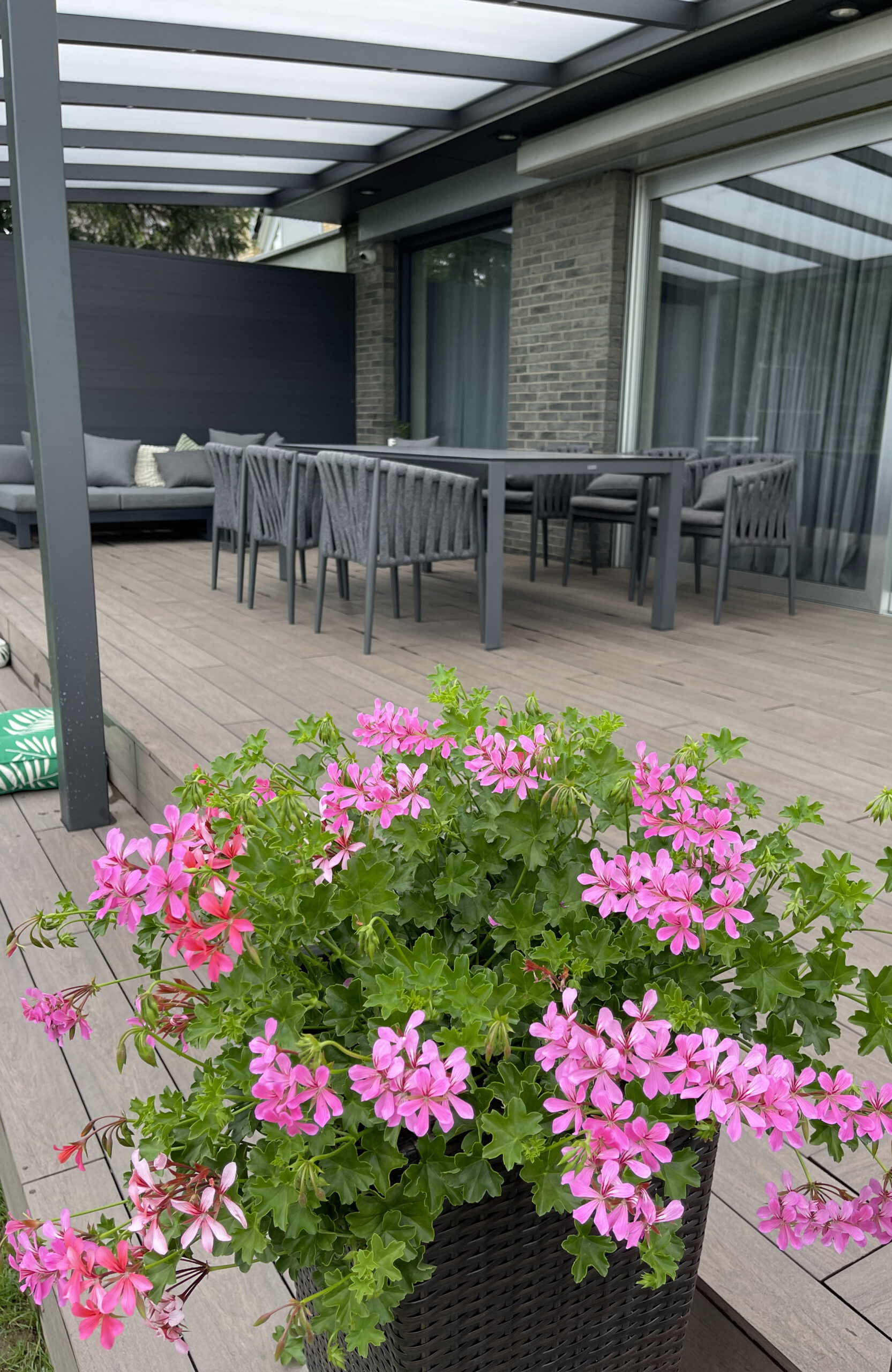 Modern garden terrace with pergola and BRUGGAN Multicolor Wenge decking boards