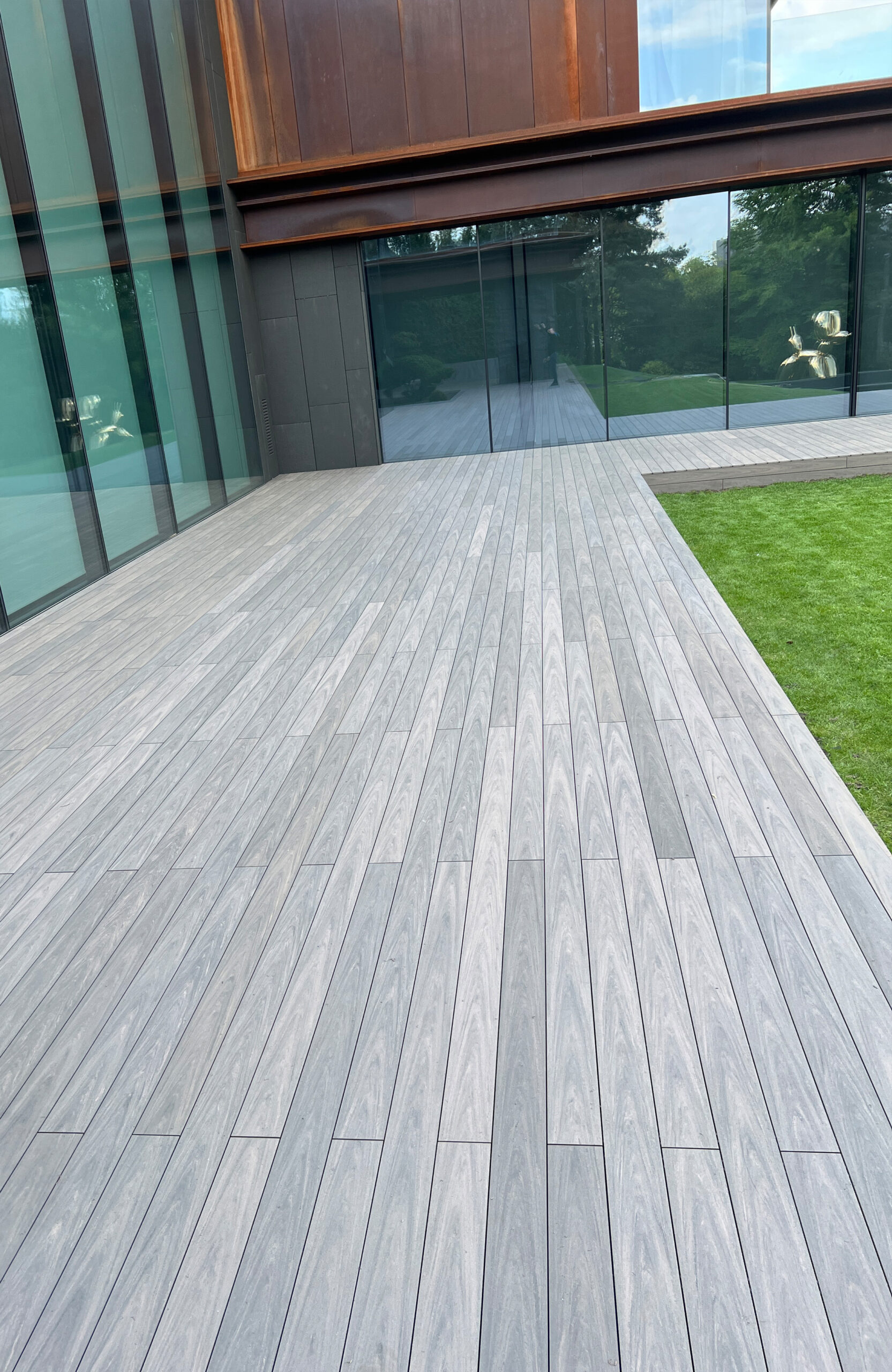 Modern villa terrace with BRUGGAN Multicolor Wenge composite decking in Kyiv