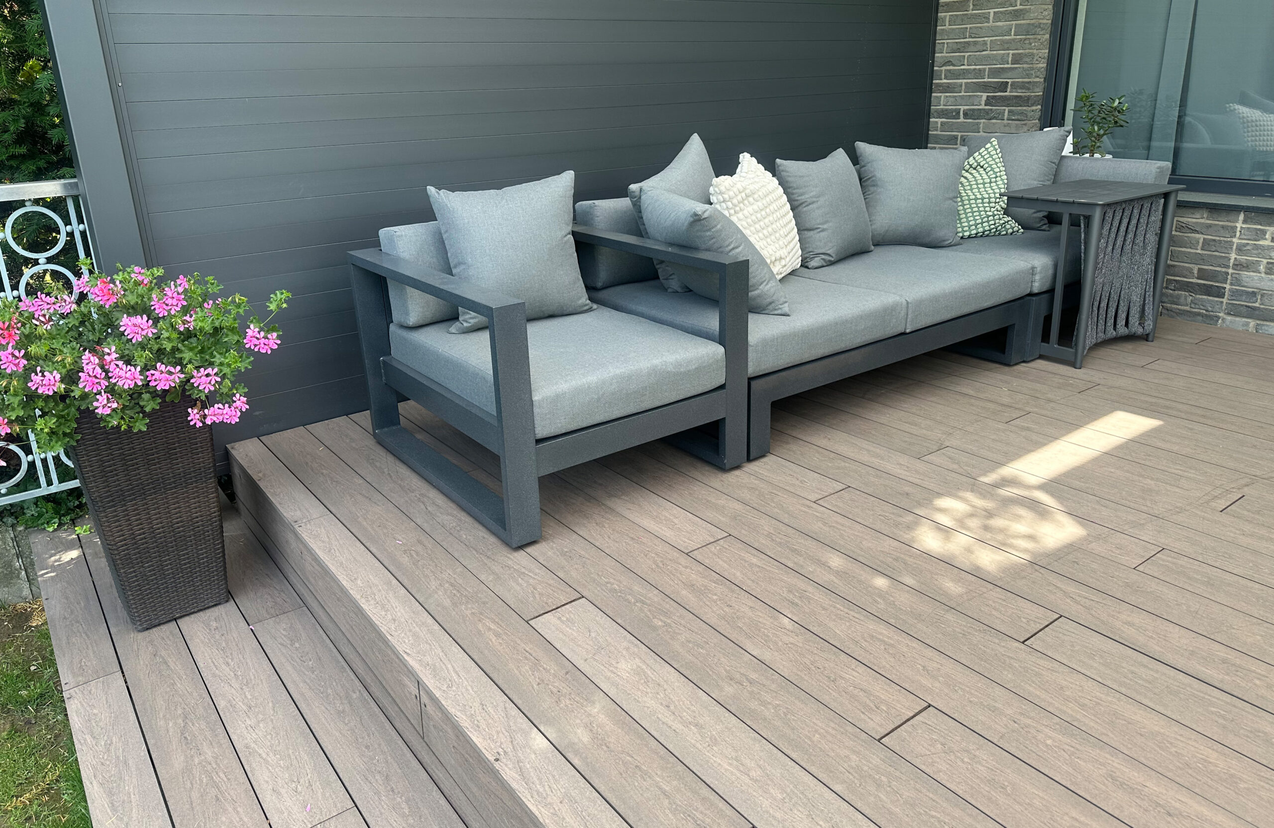 BRUGGAN Multicolor Wenge terrace decking with steps and stylish outdoor lounge area