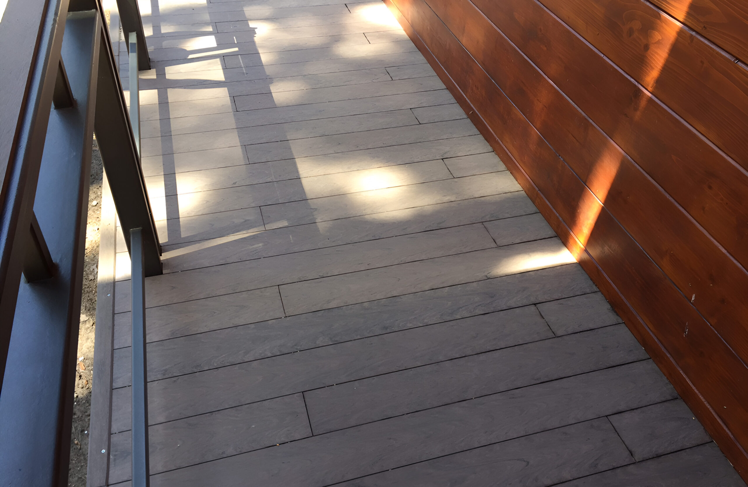 Outdoor terrace and steps finished with BRUGGAN Multicolor Wenge composite decking