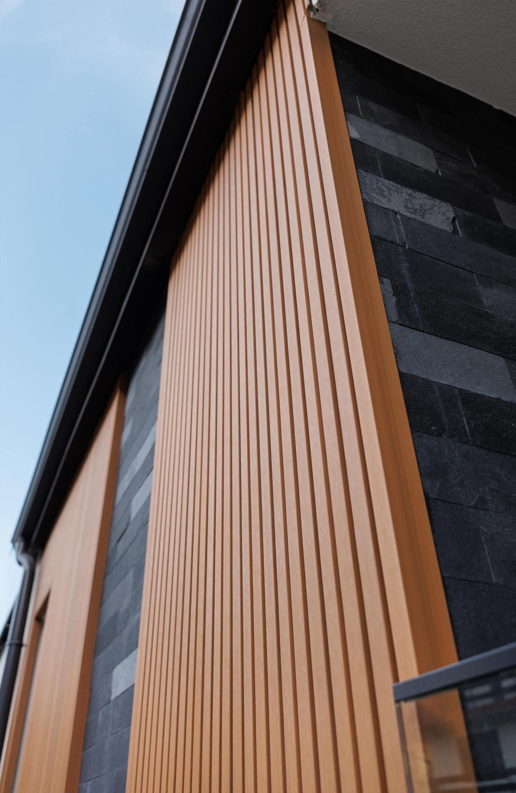 Modern house facade with LEGRO Maple vertical composite cladding