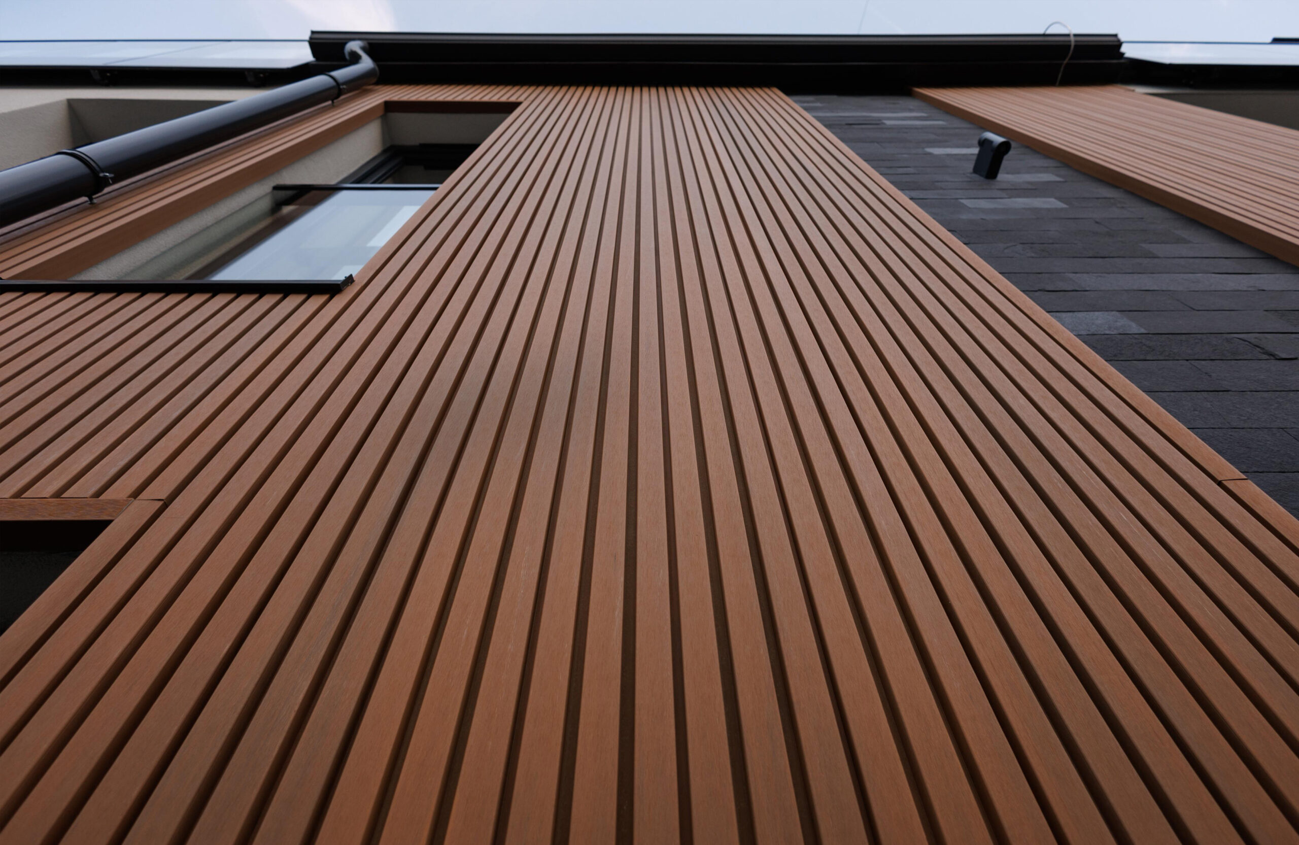 Modern house facade with LEGRO Maple vertical composite cladding