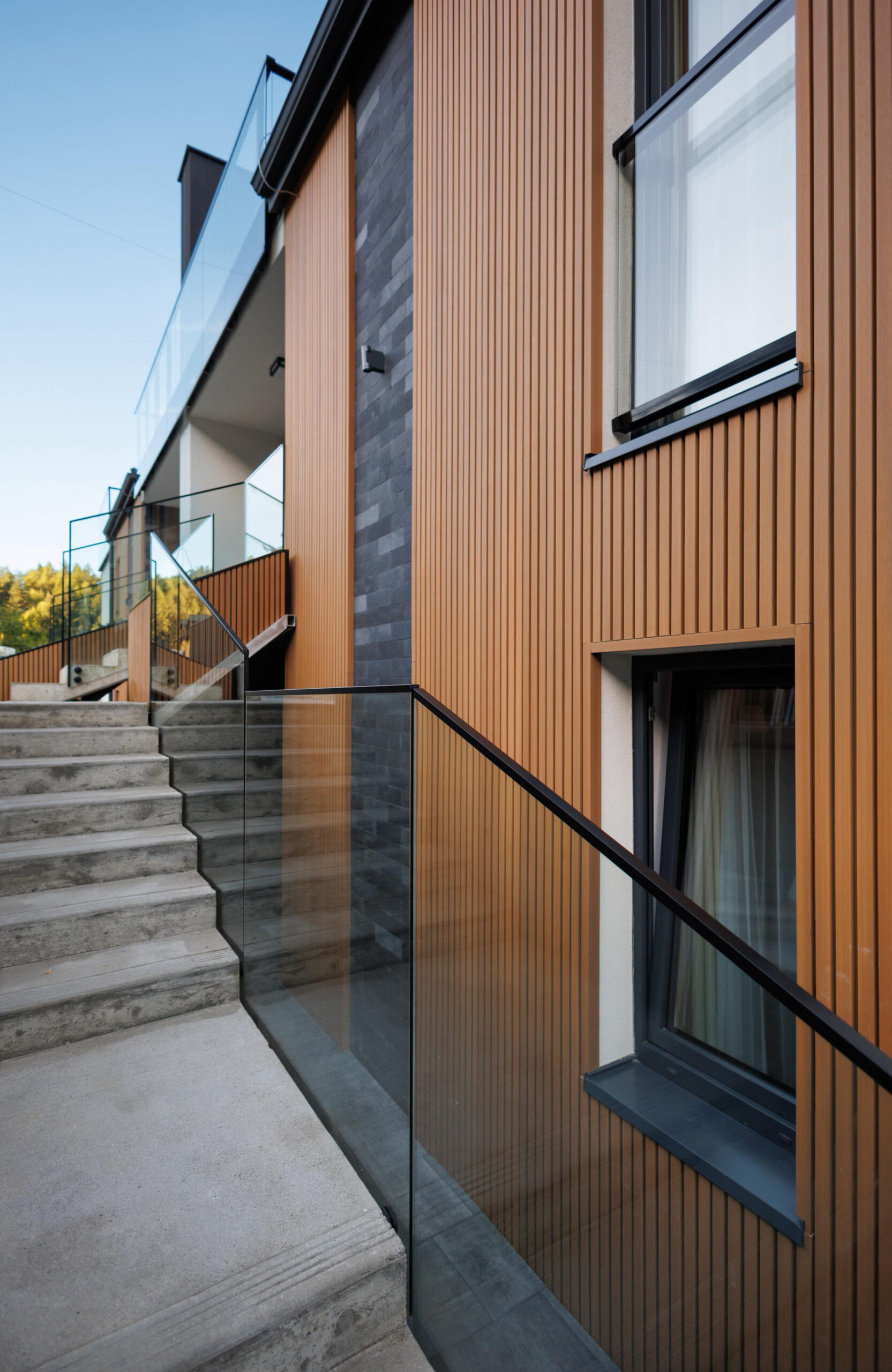 Modern house facade with LEGRO Maple vertical composite cladding