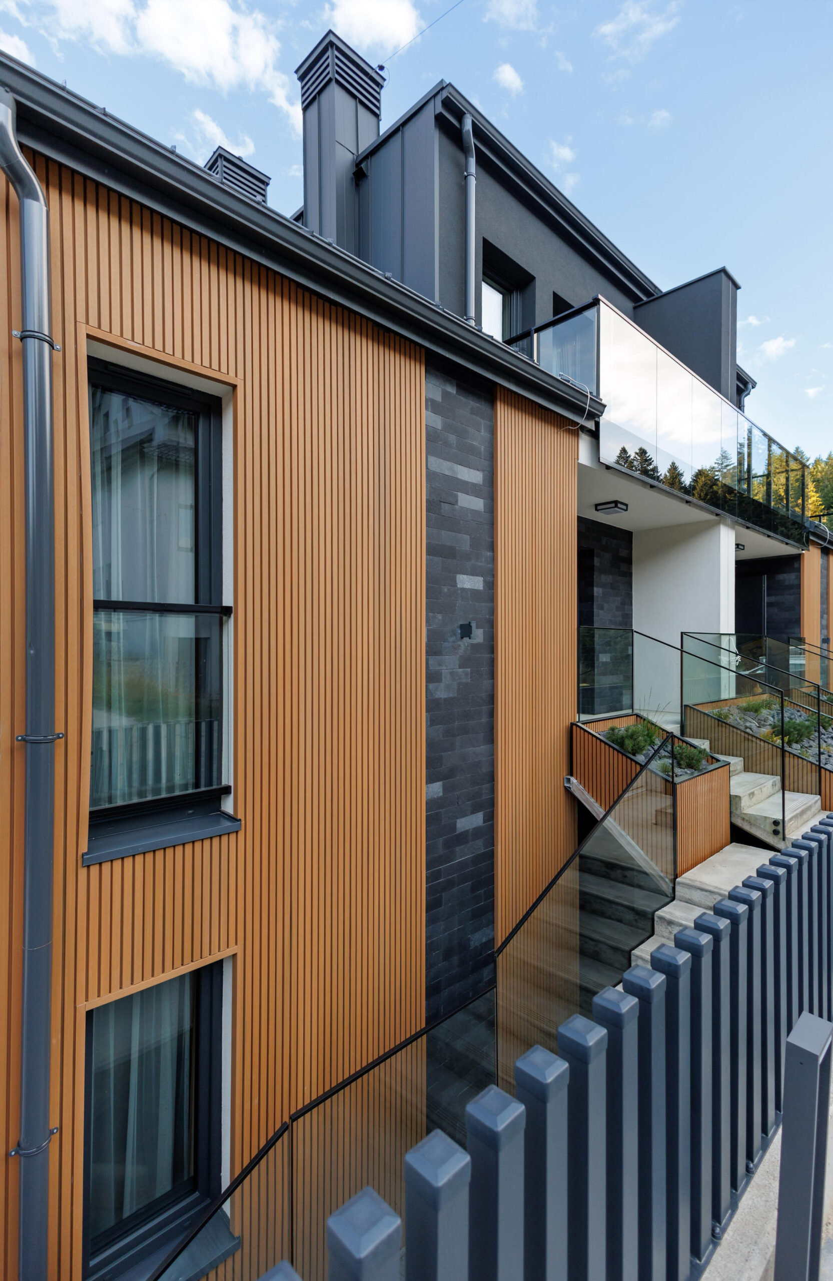 Modern house facade with LEGRO Maple vertical composite cladding